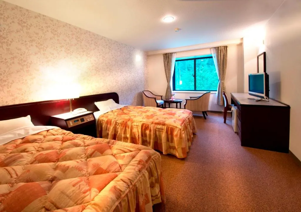 Bed in Azumino Hotaka View Hotel