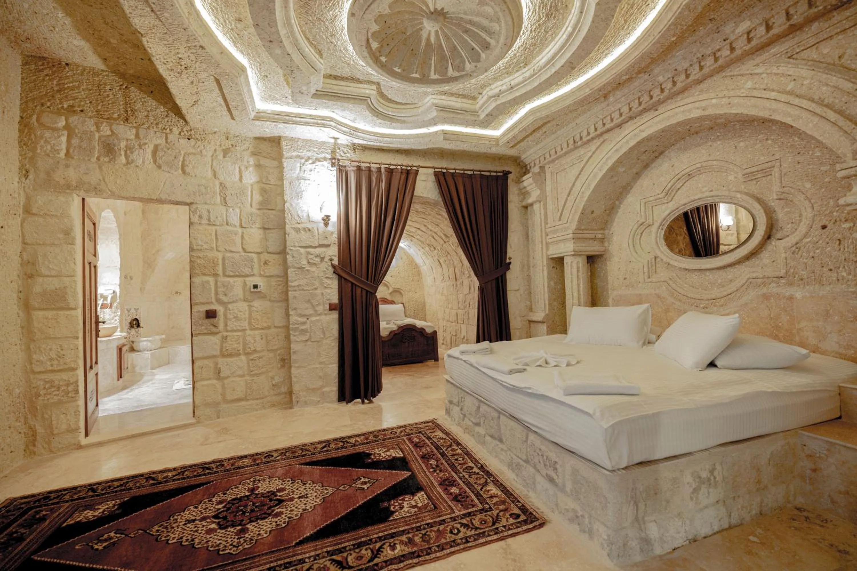 Bed in Kemerhan Cave Suites