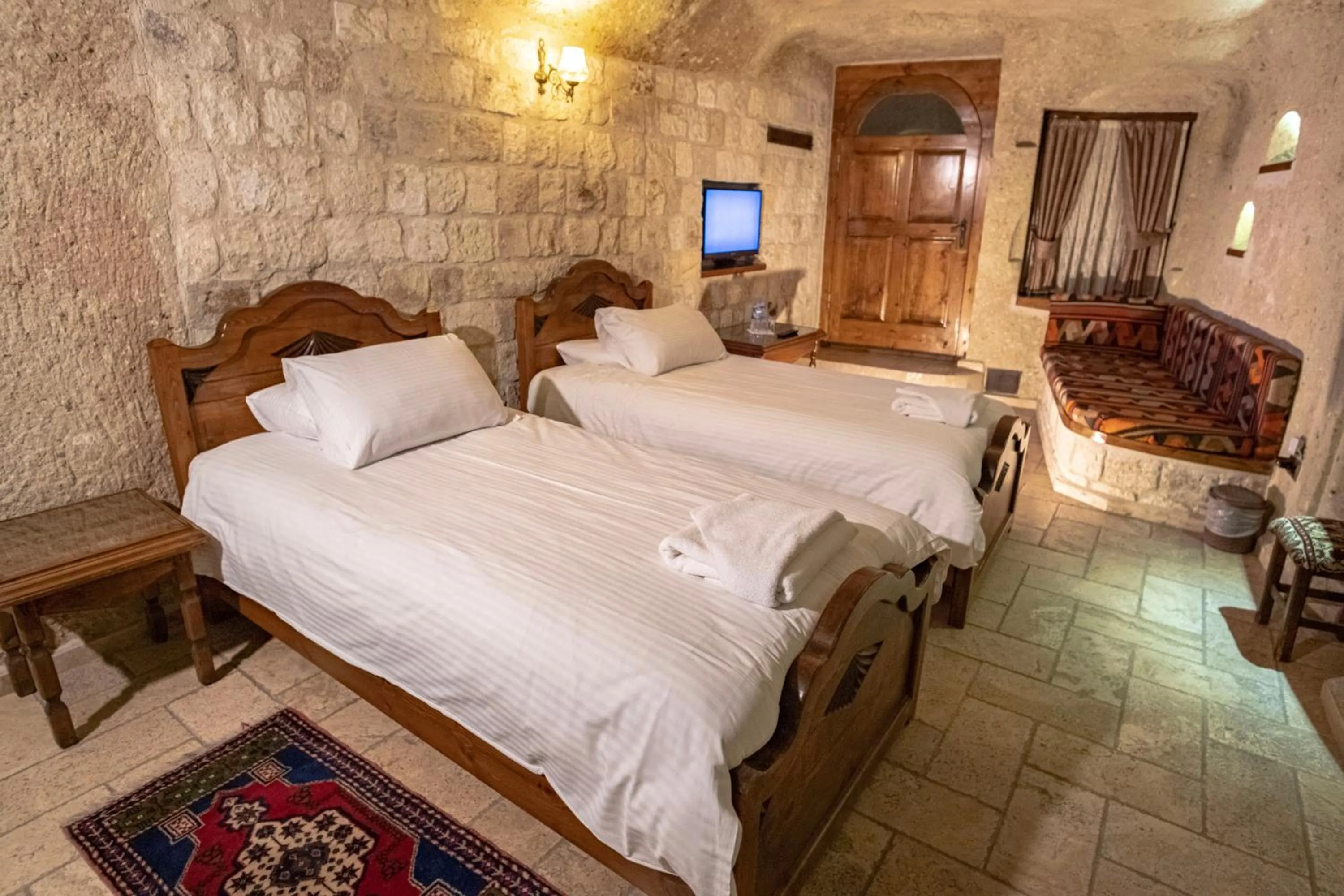 Bed in Kemerhan Cave Suites