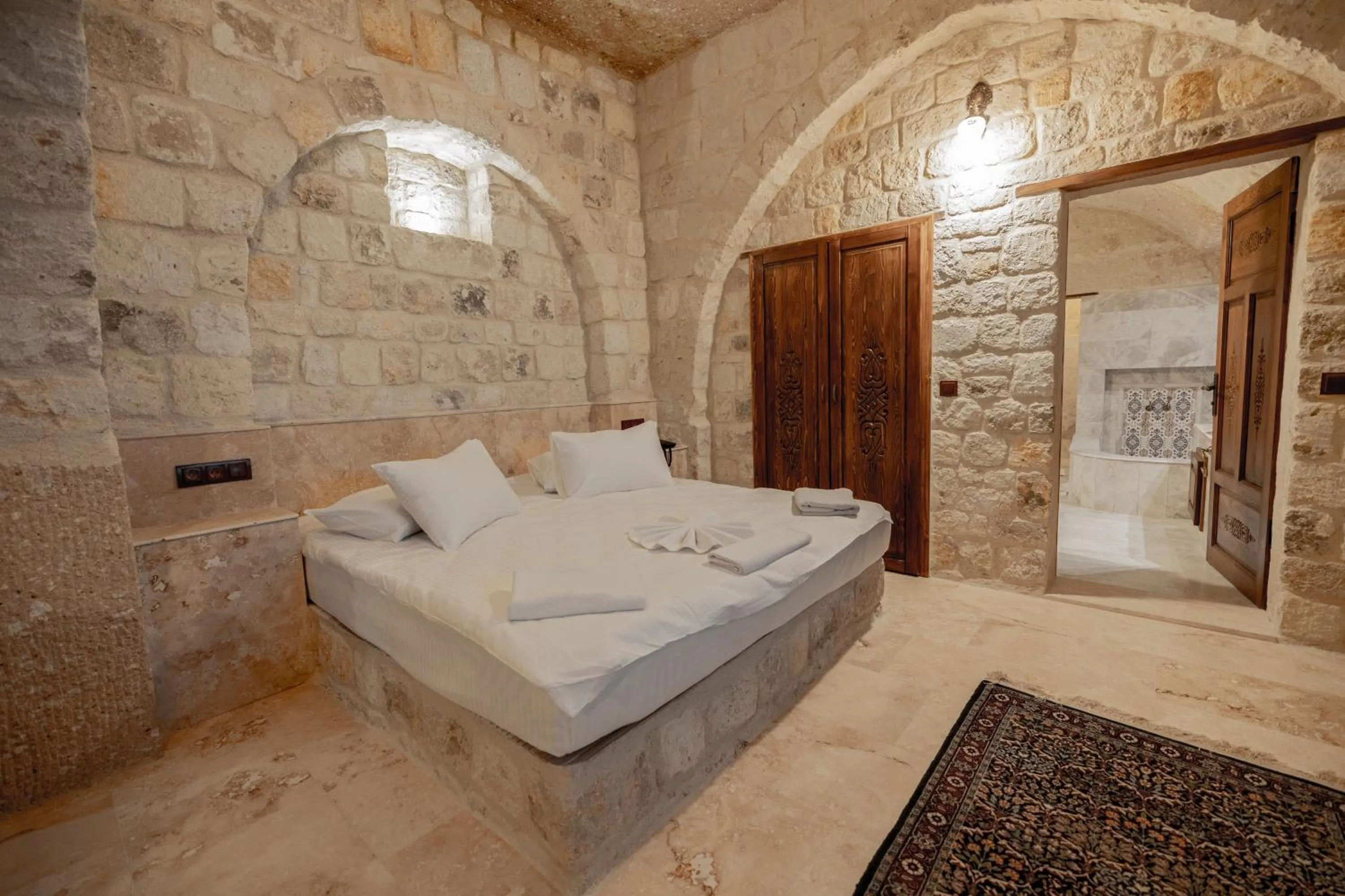 Bed in Kemerhan Cave Suites