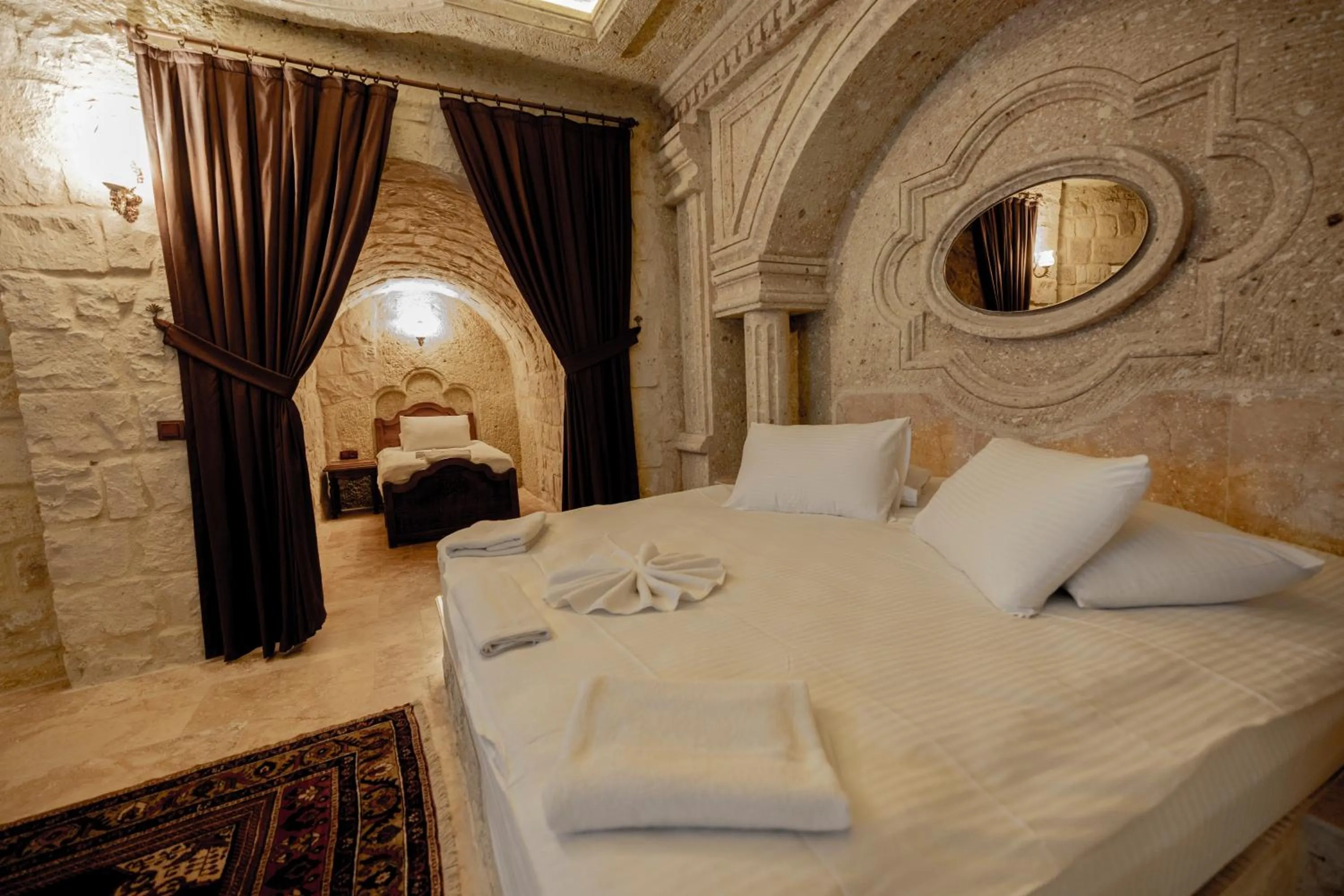 Bed in Kemerhan Cave Suites
