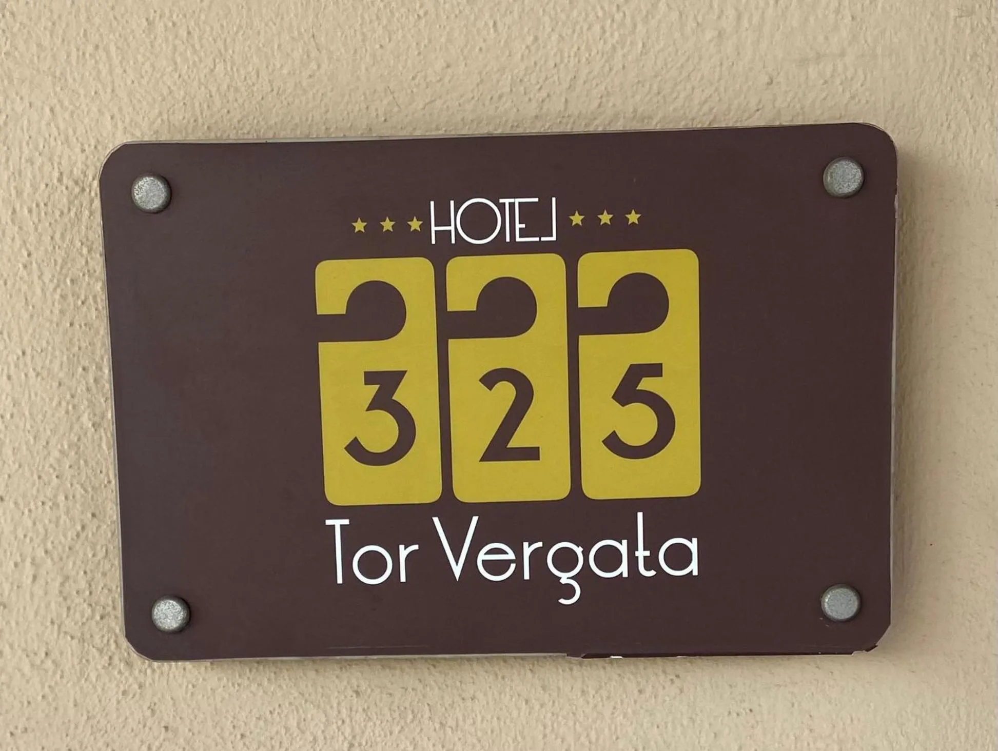 Property logo or sign in Hotel 325 Tor Vergata