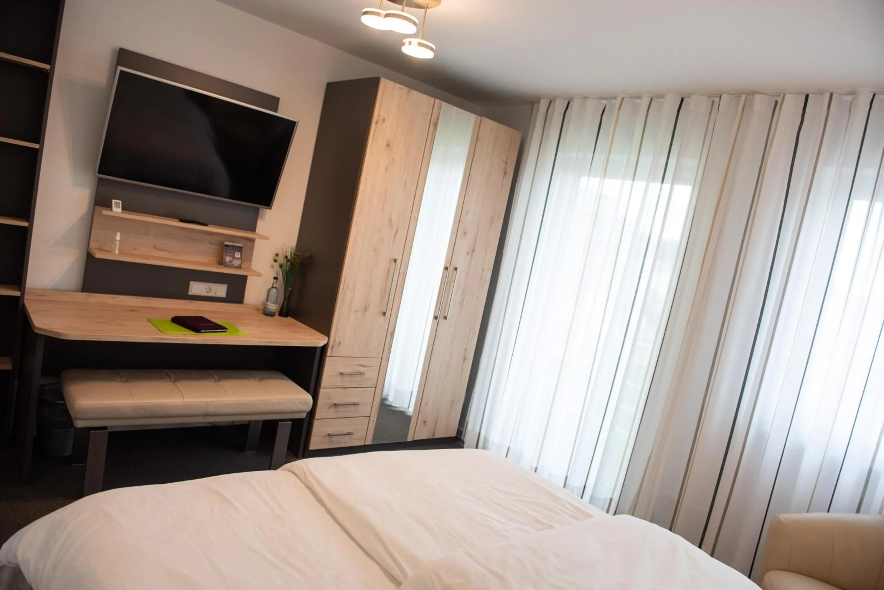 Bed in Apartments Amtzell, Selbst-Check-in