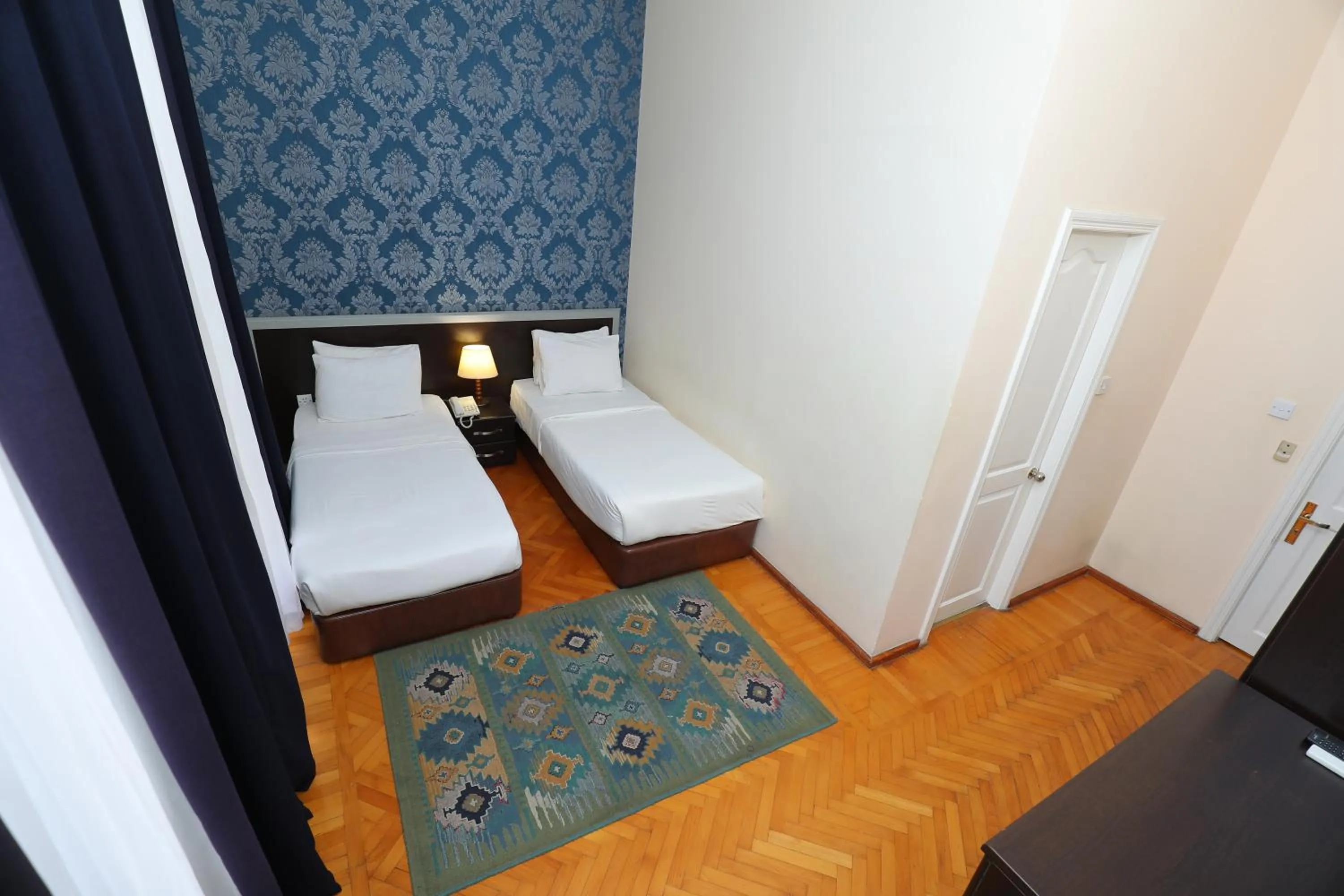 Photo of the whole room, Bed in Azcot Hotel - Nizami Street