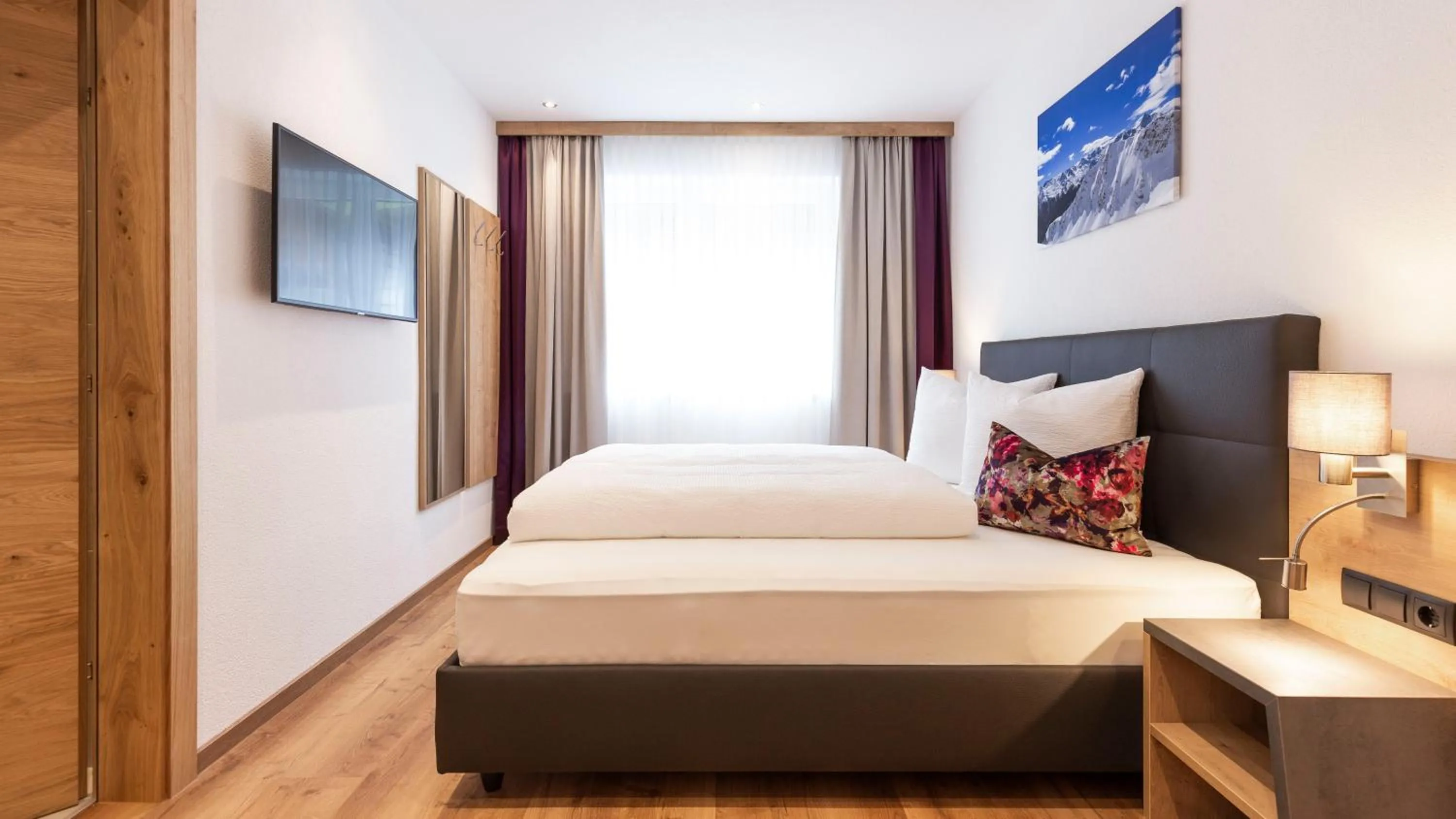 Bed in Aparthotel Lerch