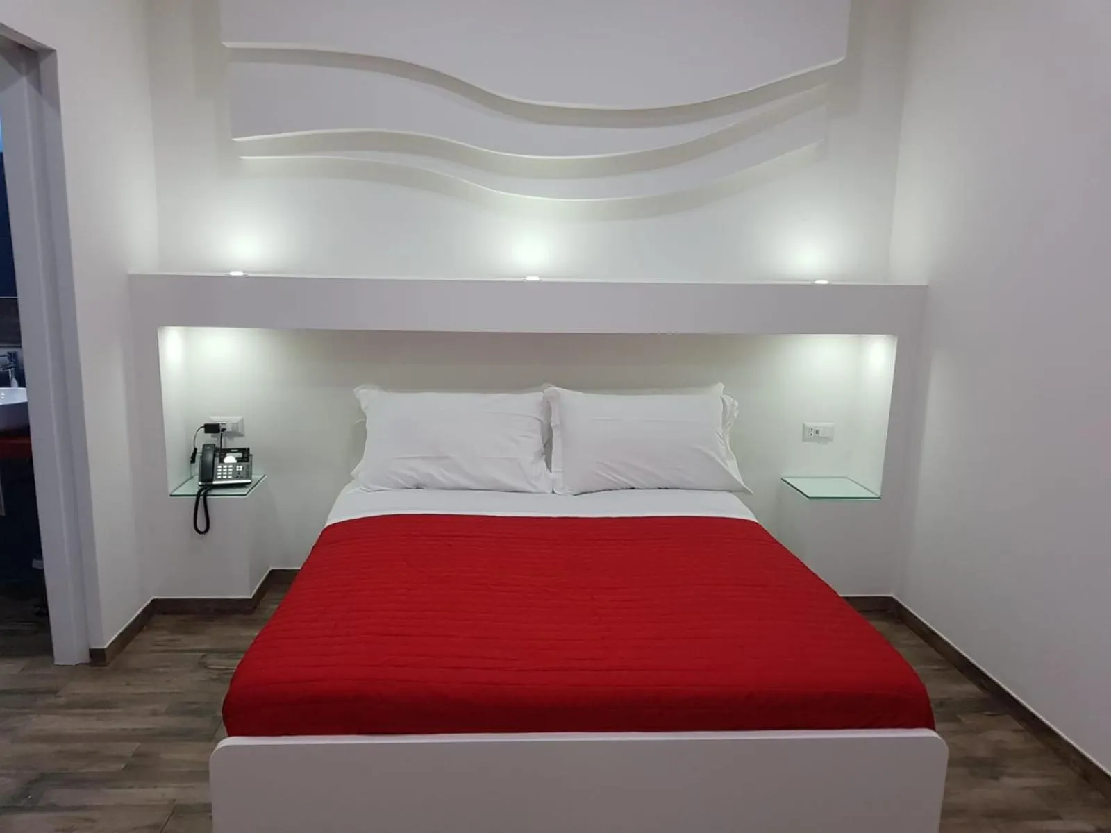 Bed in VILLA ADELAIDE SUITE & ROOM