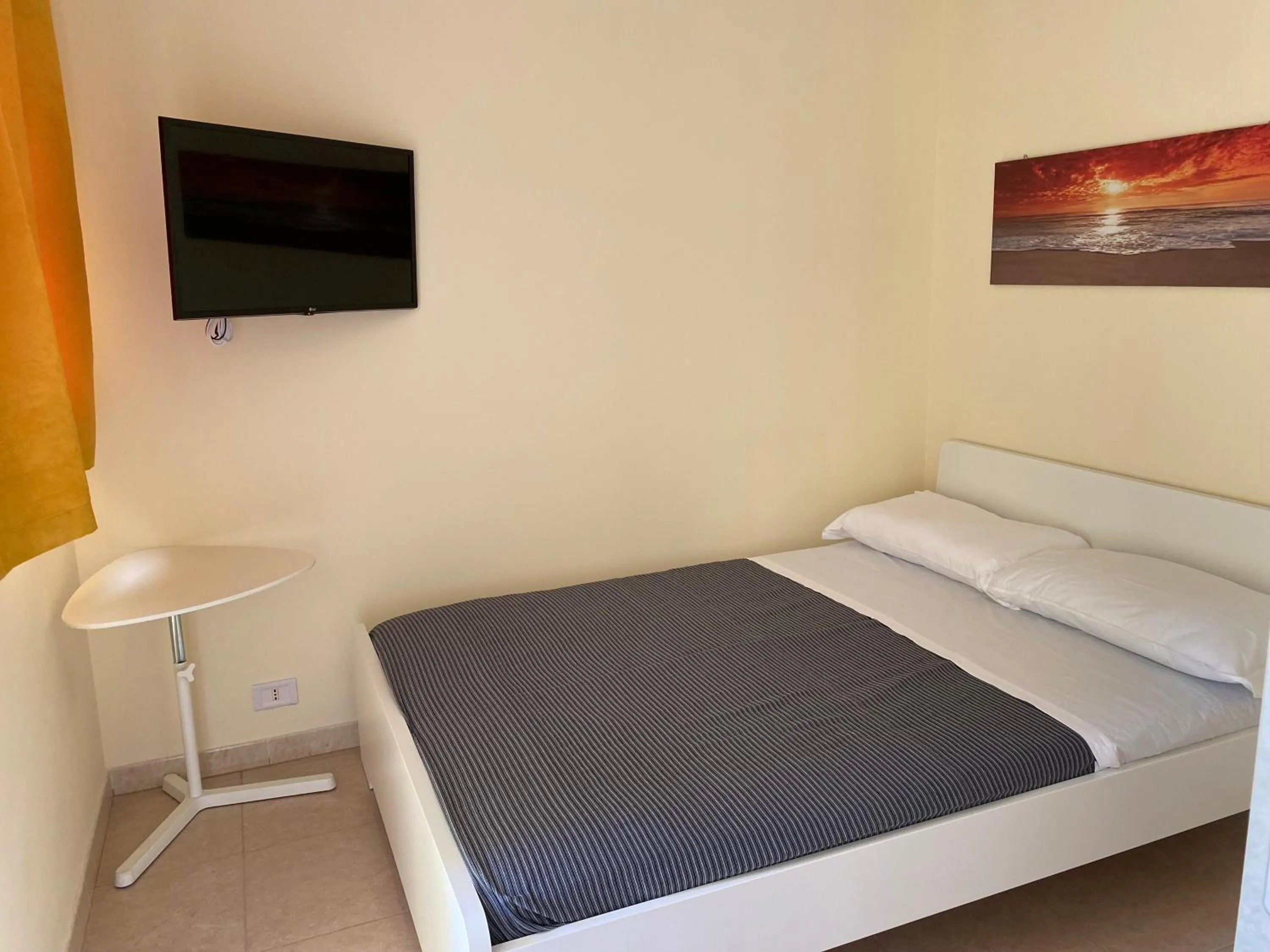 Bed in VILLA ADELAIDE SUITE & ROOM