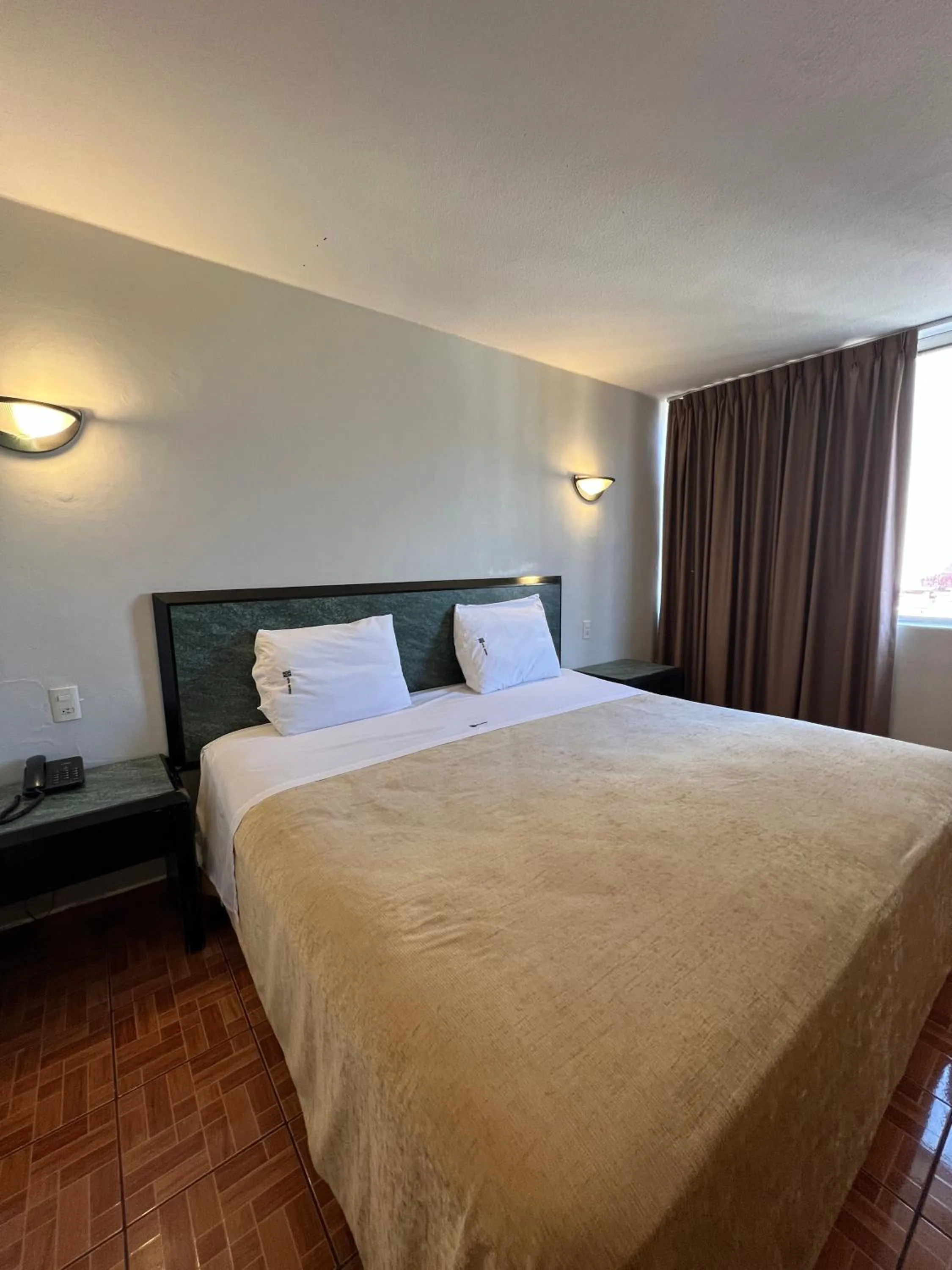 Bed in Hotel Universo