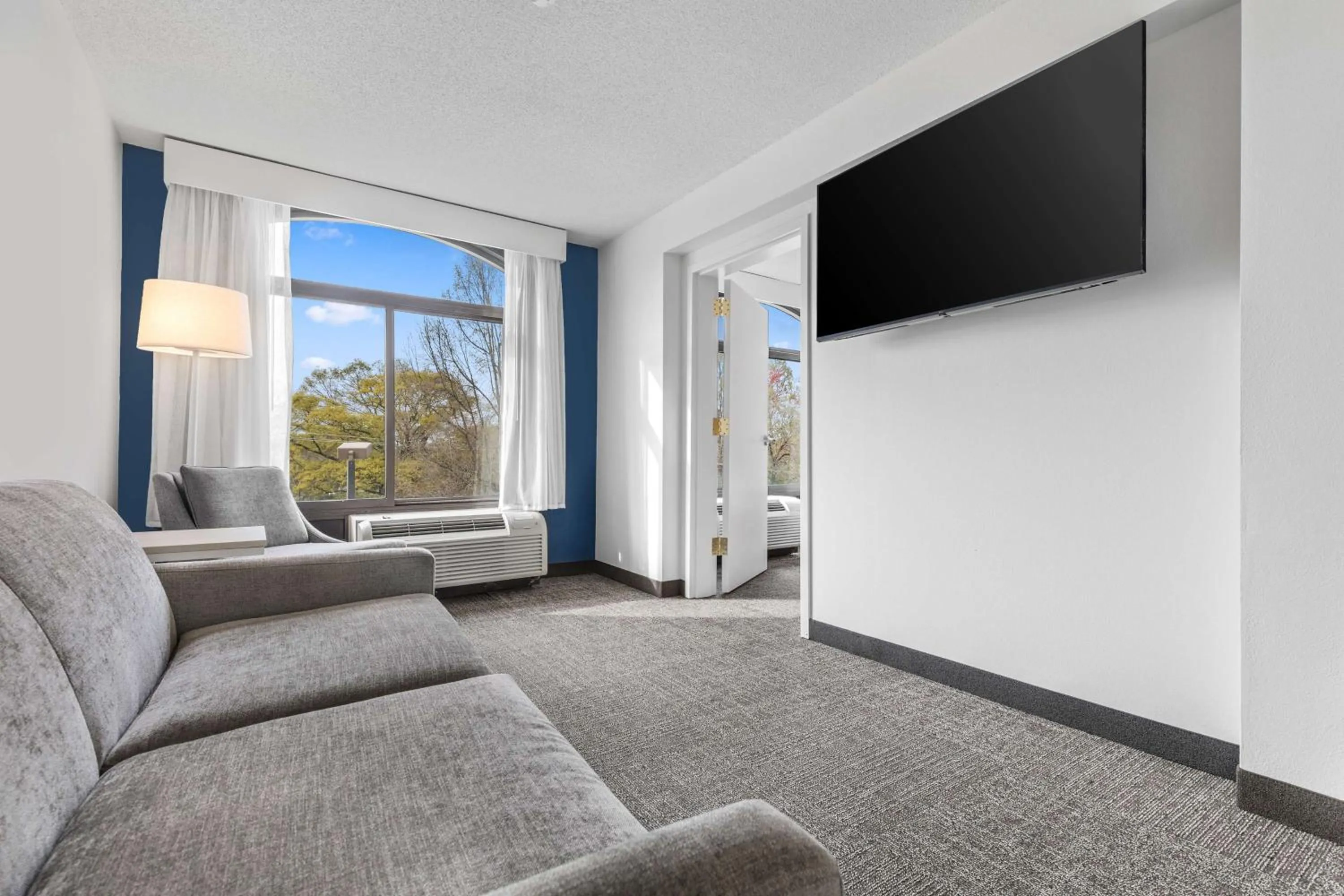 Living room in Spark By Hilton Charlotte Tyvola I-77