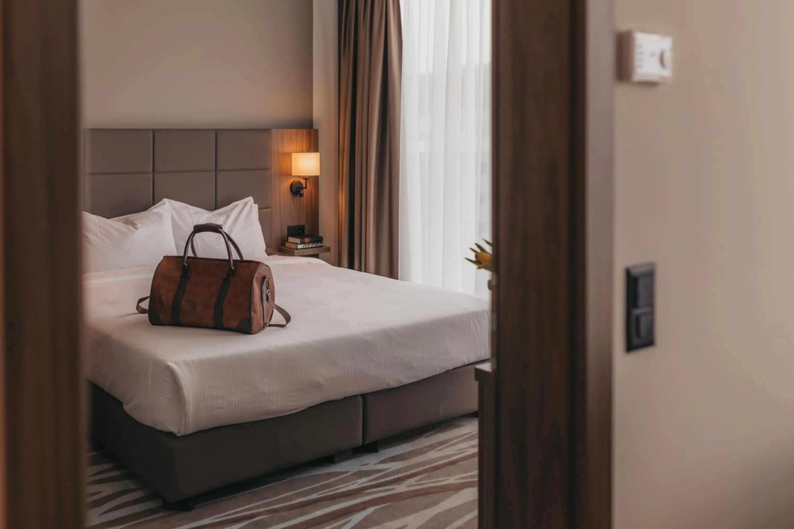 Decorative detail, Bed in IIP Apartments - Self Check-In