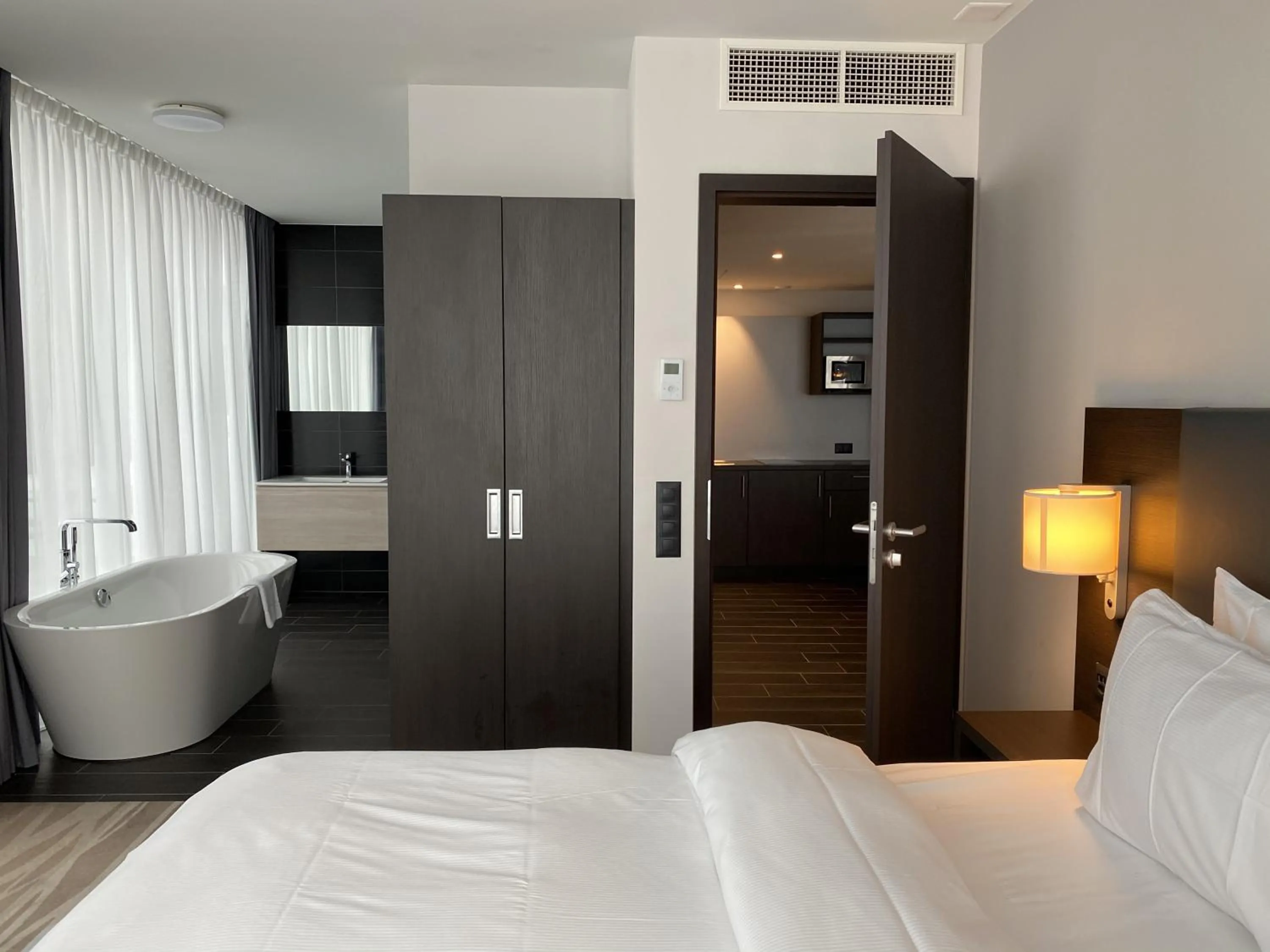 Bathroom, Bed in IIP Apartments - Self Check-In