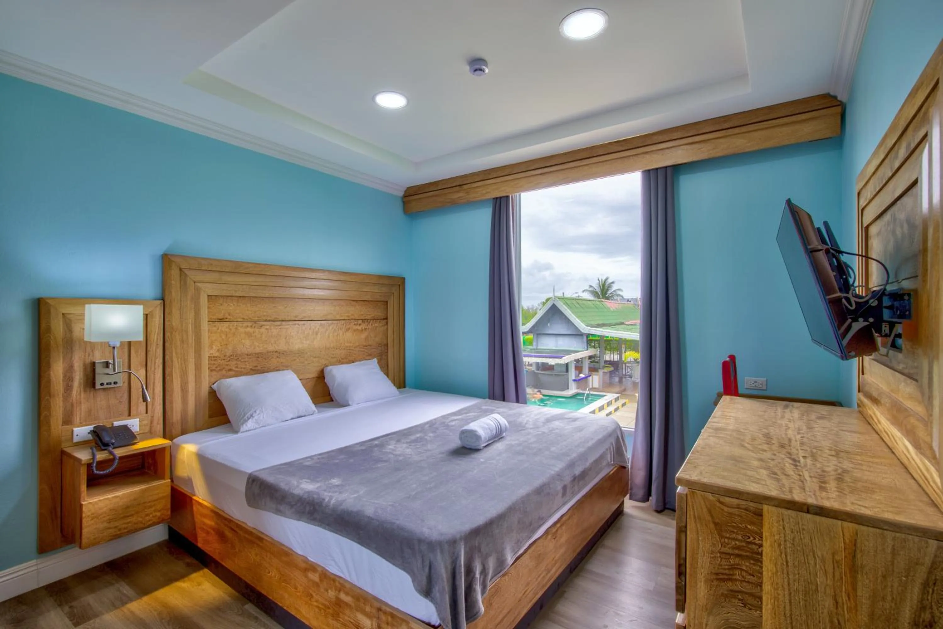 Bed in Airport Suites Hotel