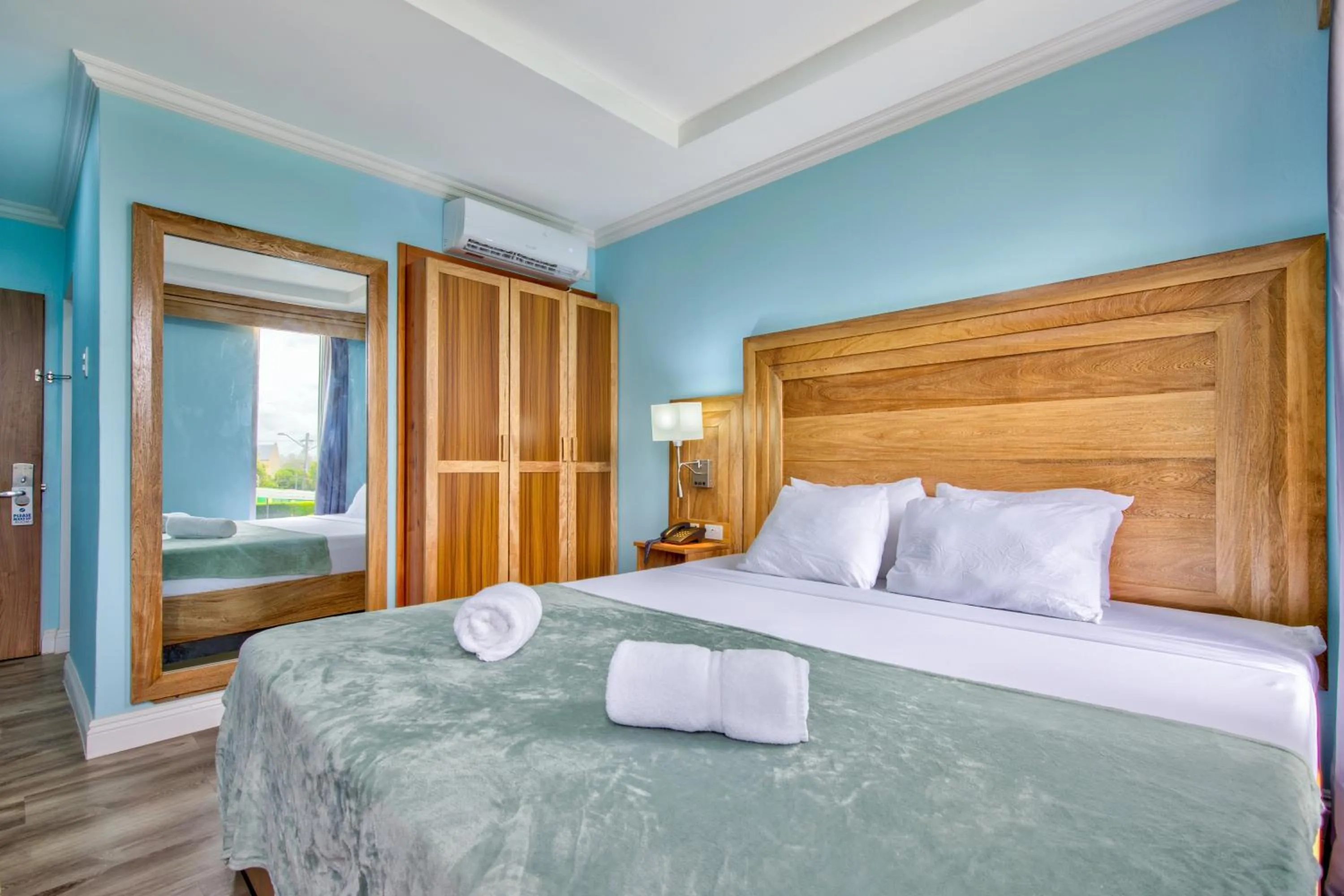 Bed in Airport Suites Hotel