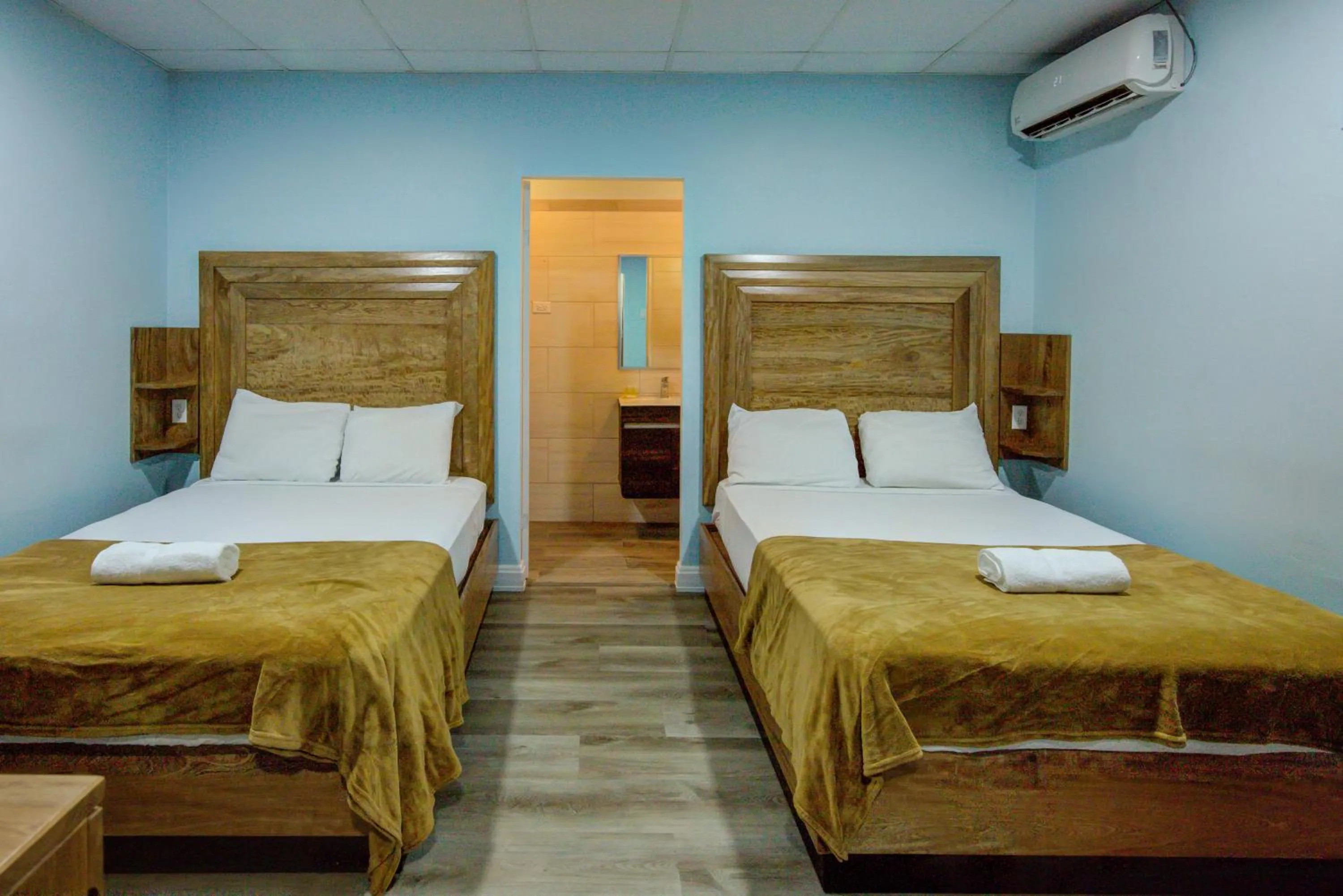 Bed in Airport Suites Hotel