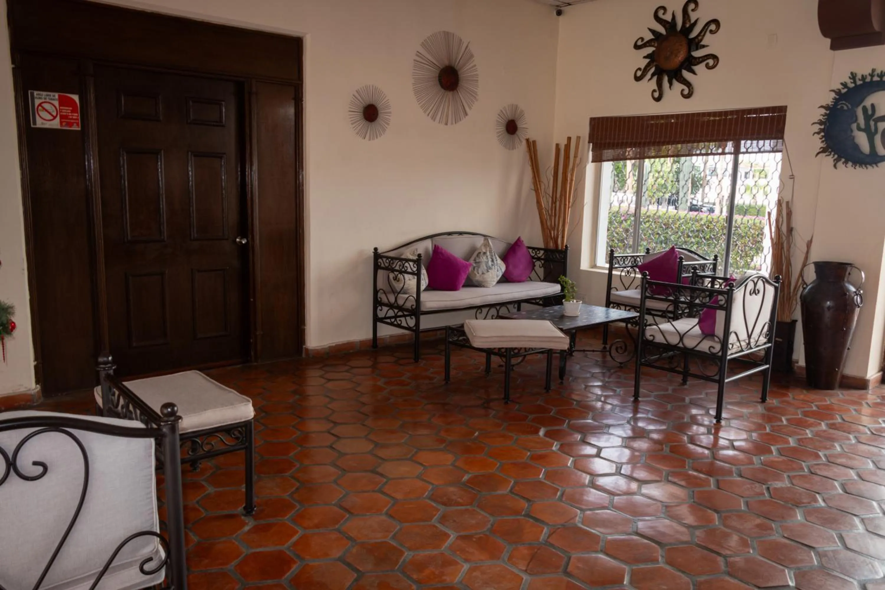 Seating area in Hotel Hacienda Bugambilias La Paz