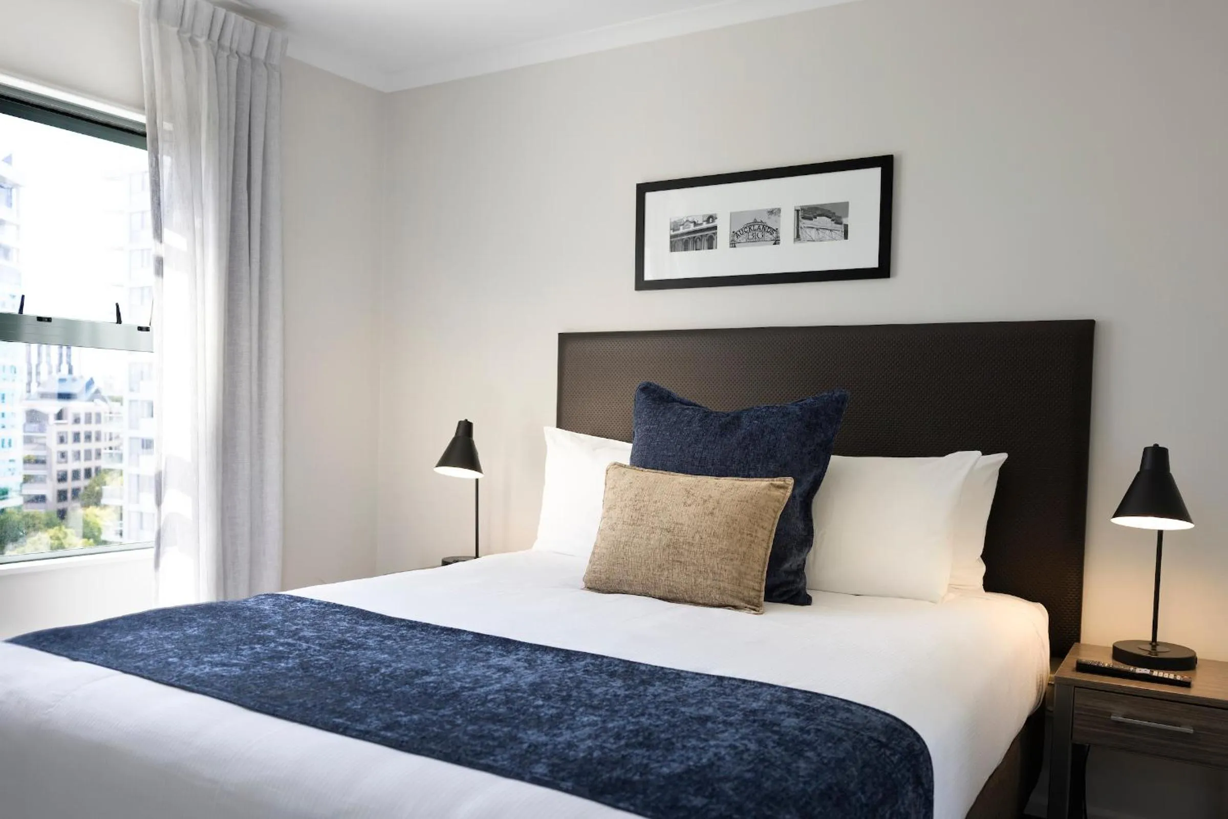 Bed in Quest Auckland Serviced Apartments