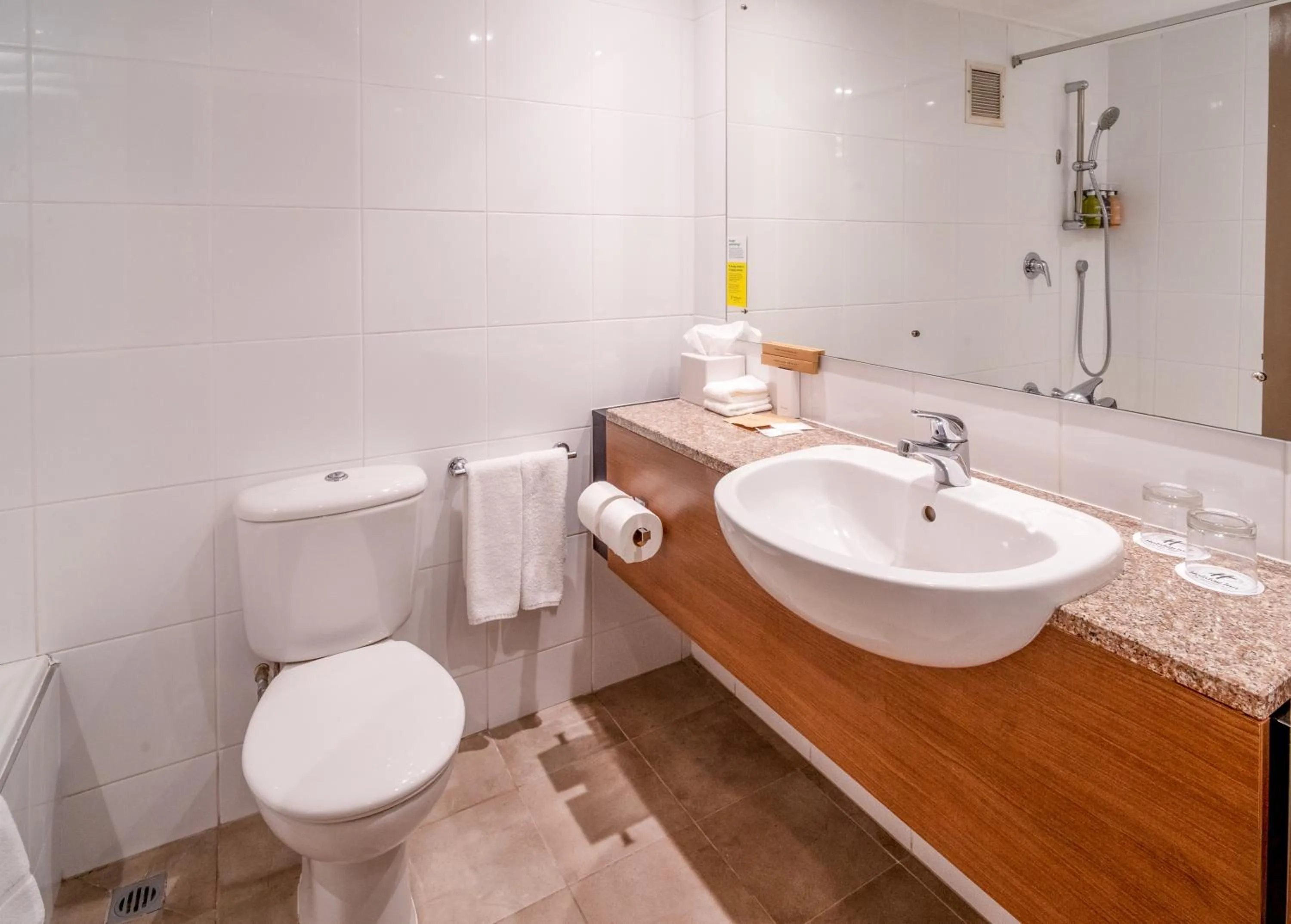 Bathroom in Holiday Inn Auckland Airport by IHG