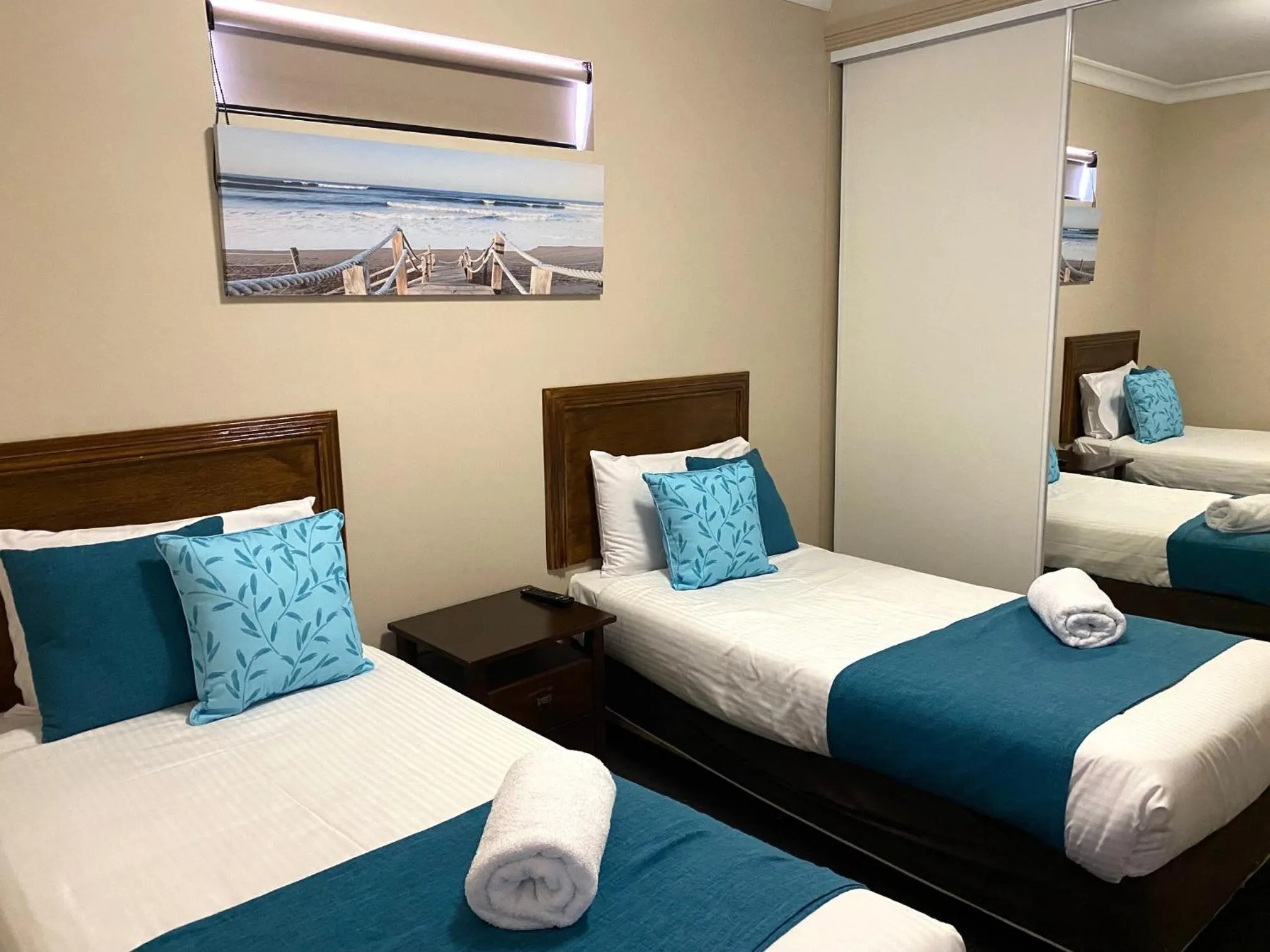 Bed in Cityville Apartments & Motel