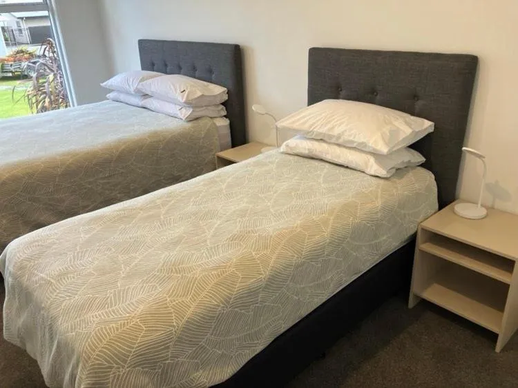 Bed in Tripinn Modern Motels & Affordable Accommodation