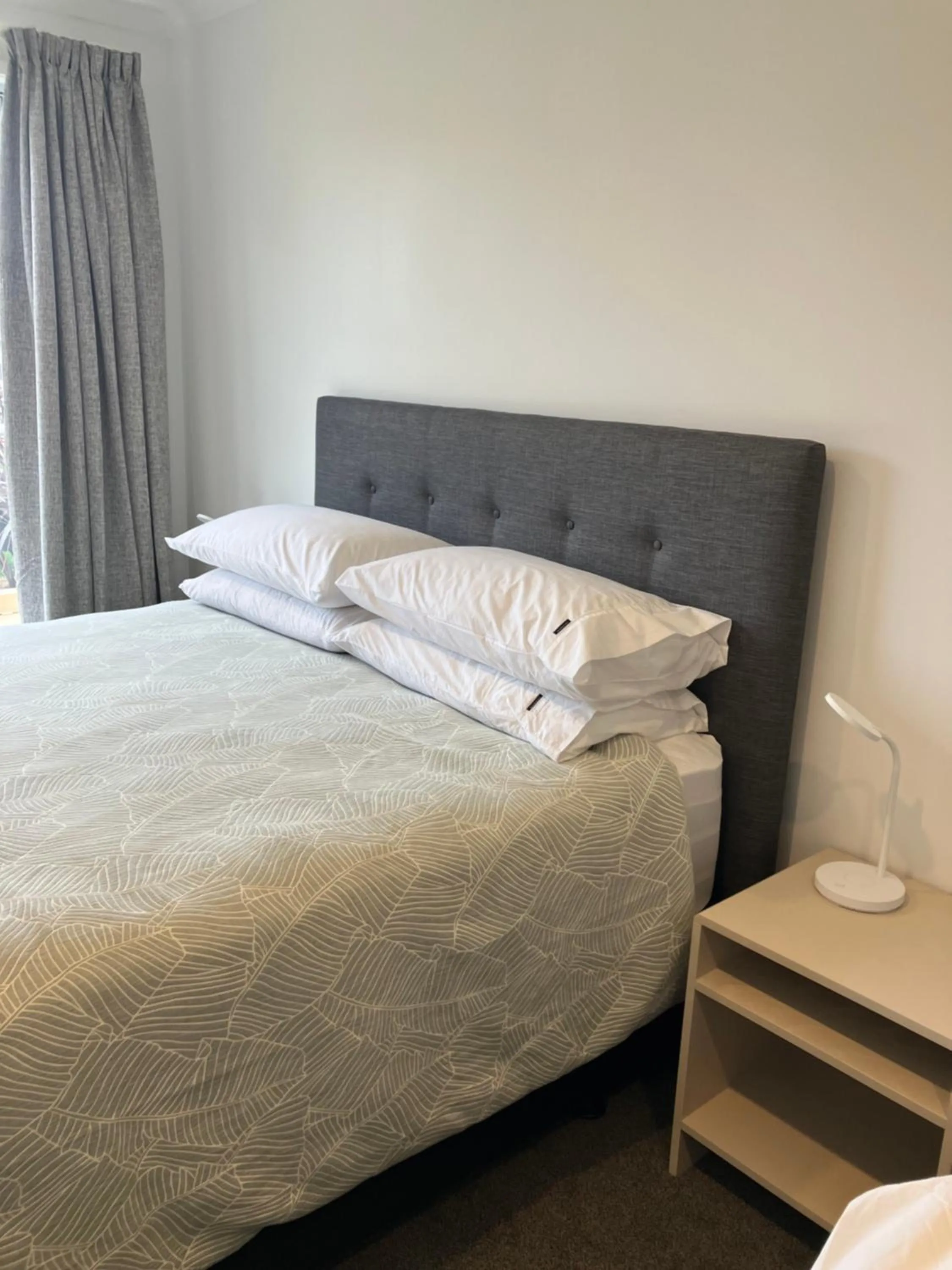 Bed in Tripinn Modern Motels & Affordable Accommodation