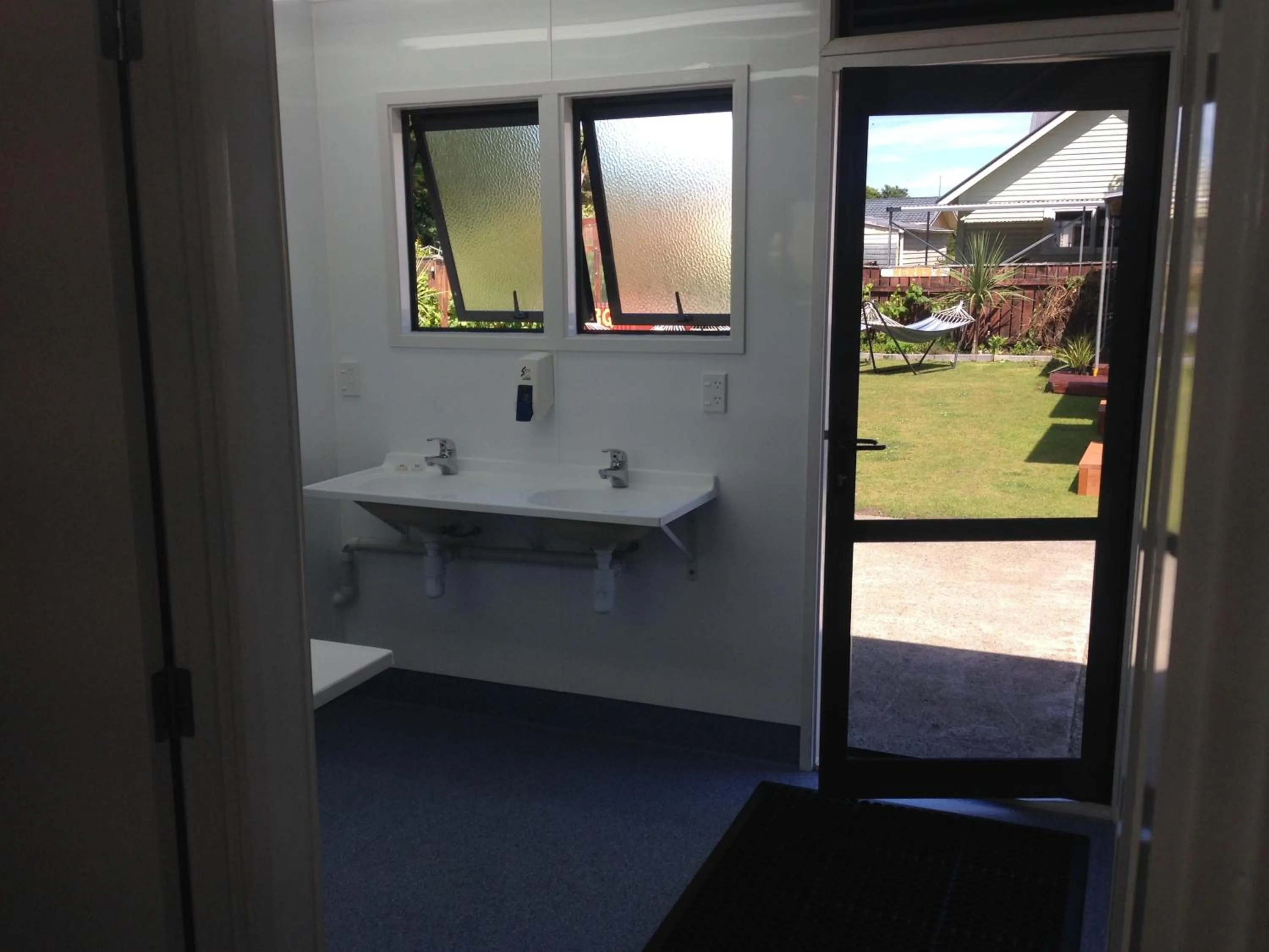Toilet in Tripinn Modern Motels & Affordable Accommodation