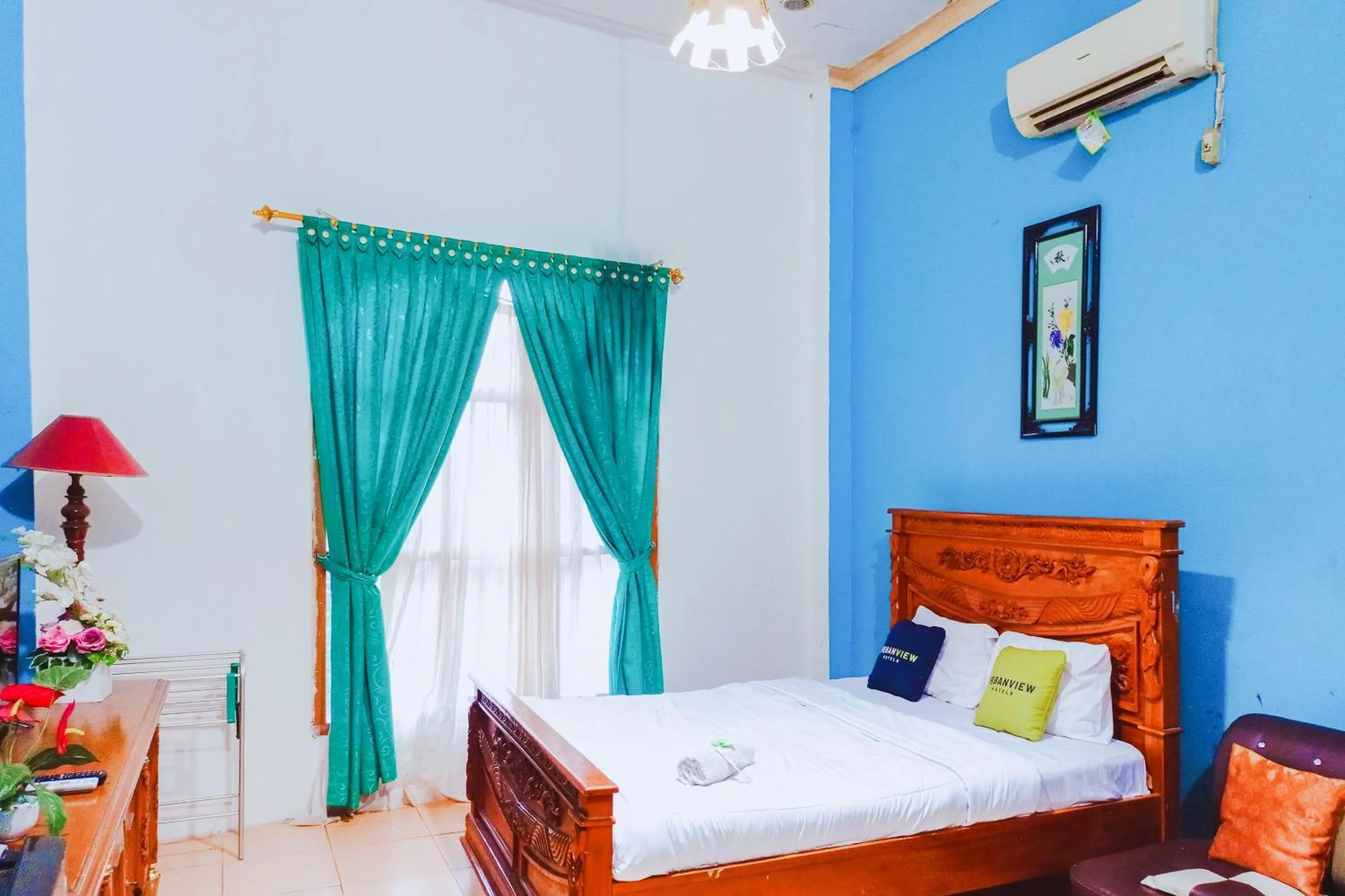 Bedroom, Bed in Urbanview at Wedika Hotel Bengkulu