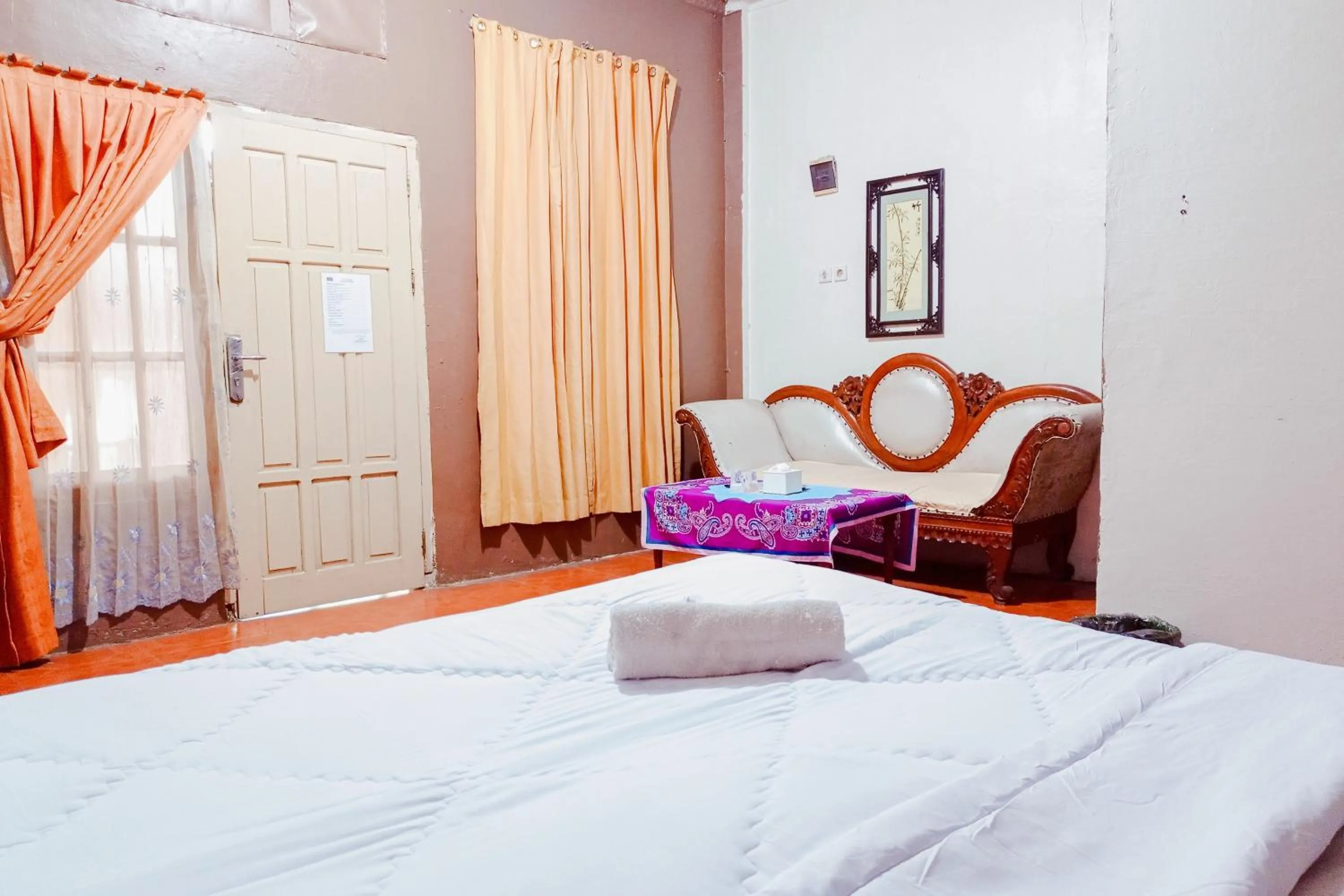 Bedroom, Bed in Urbanview at Wedika Hotel Bengkulu