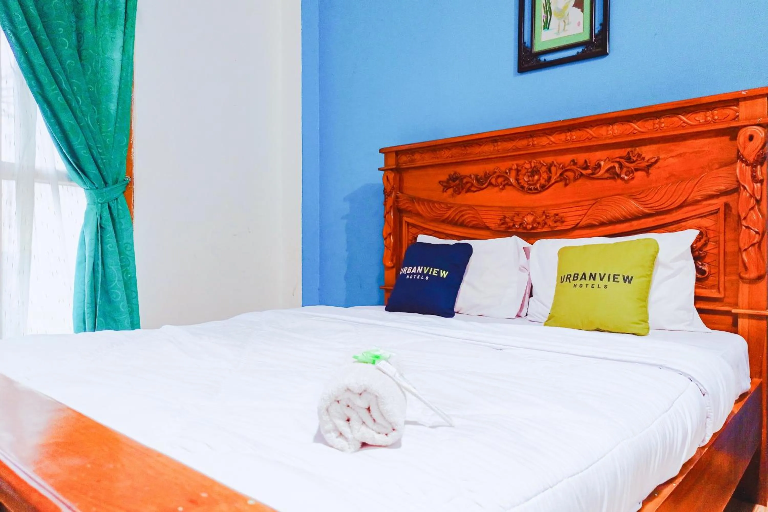 Bedroom, Bed in Urbanview at Wedika Hotel Bengkulu