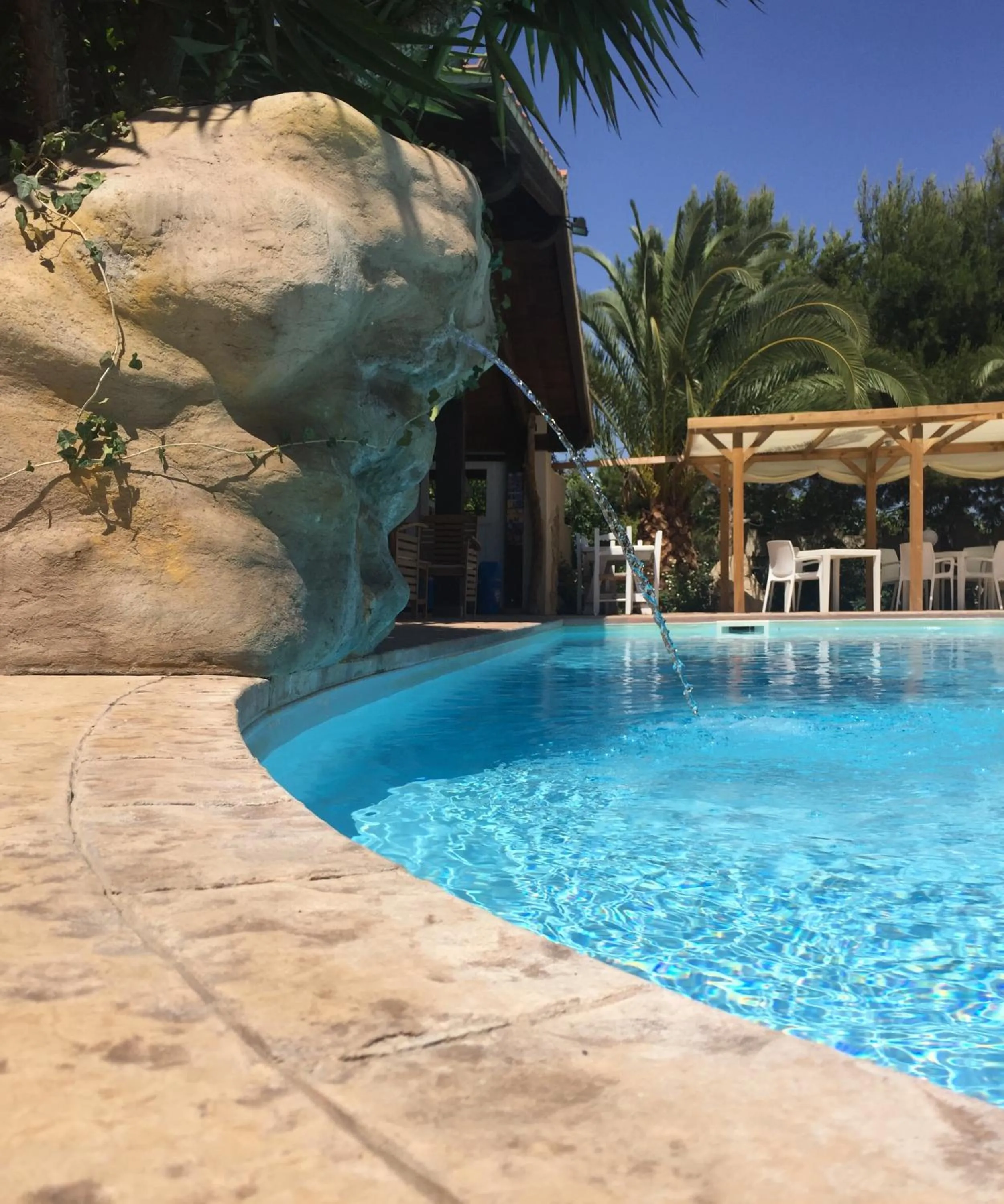 Swimming pool in Albergo Residenziale Menhirs