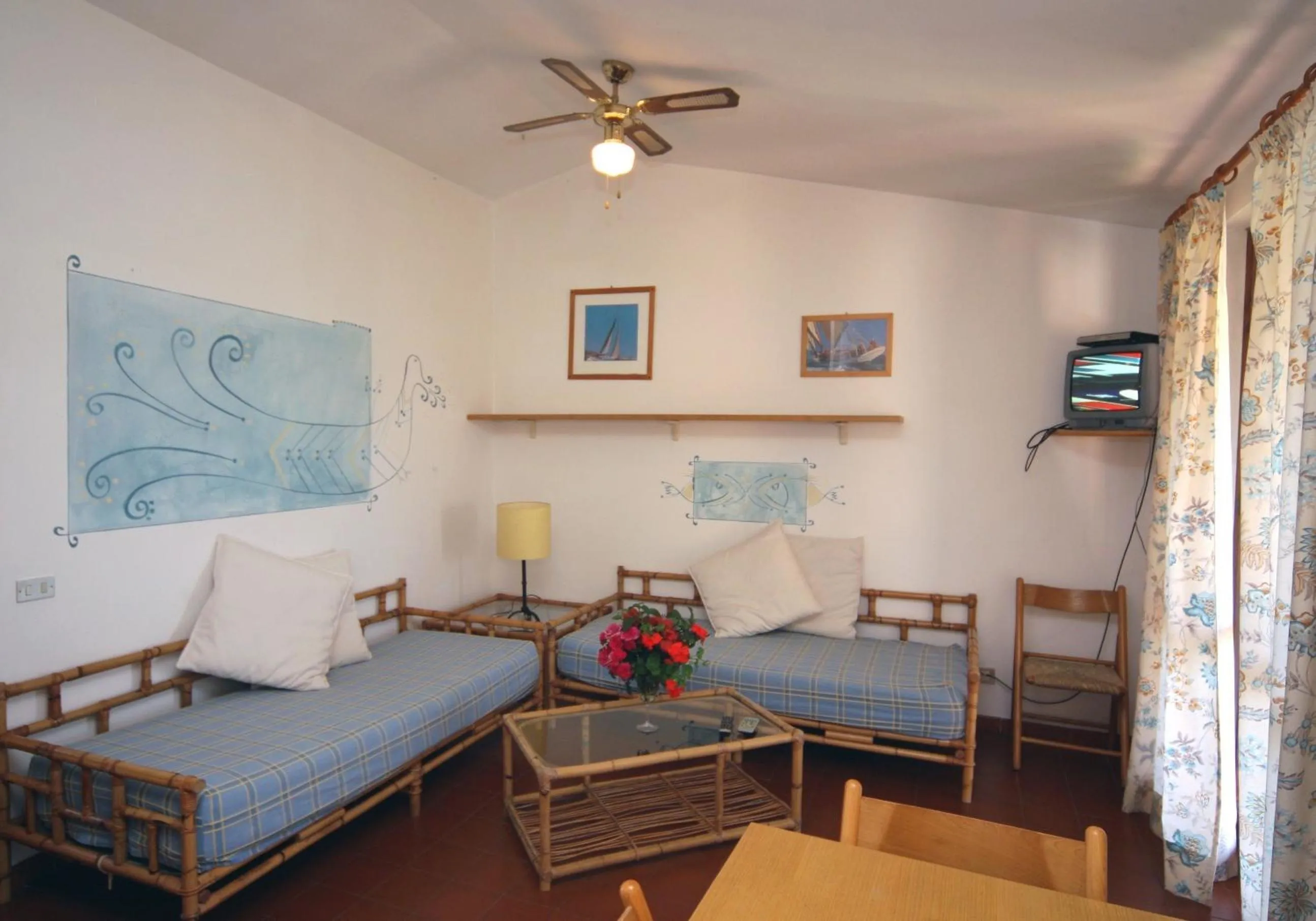 Living room, Bed in Residence Baia Salinedda