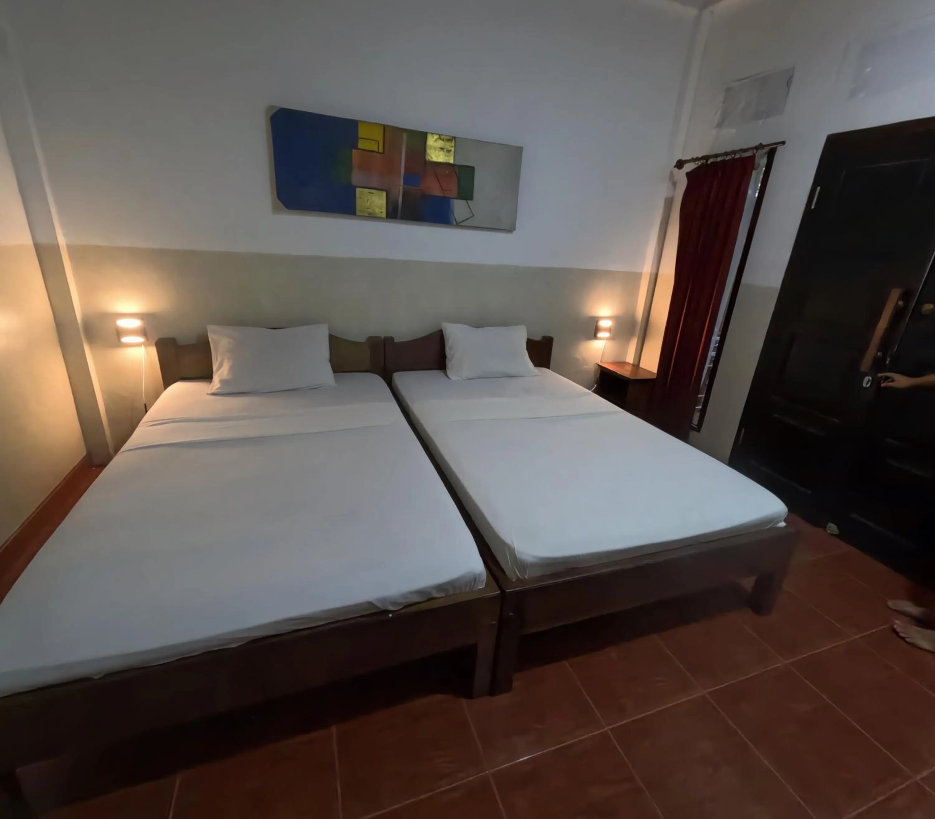 Bed in Banana Leaf Bungalow