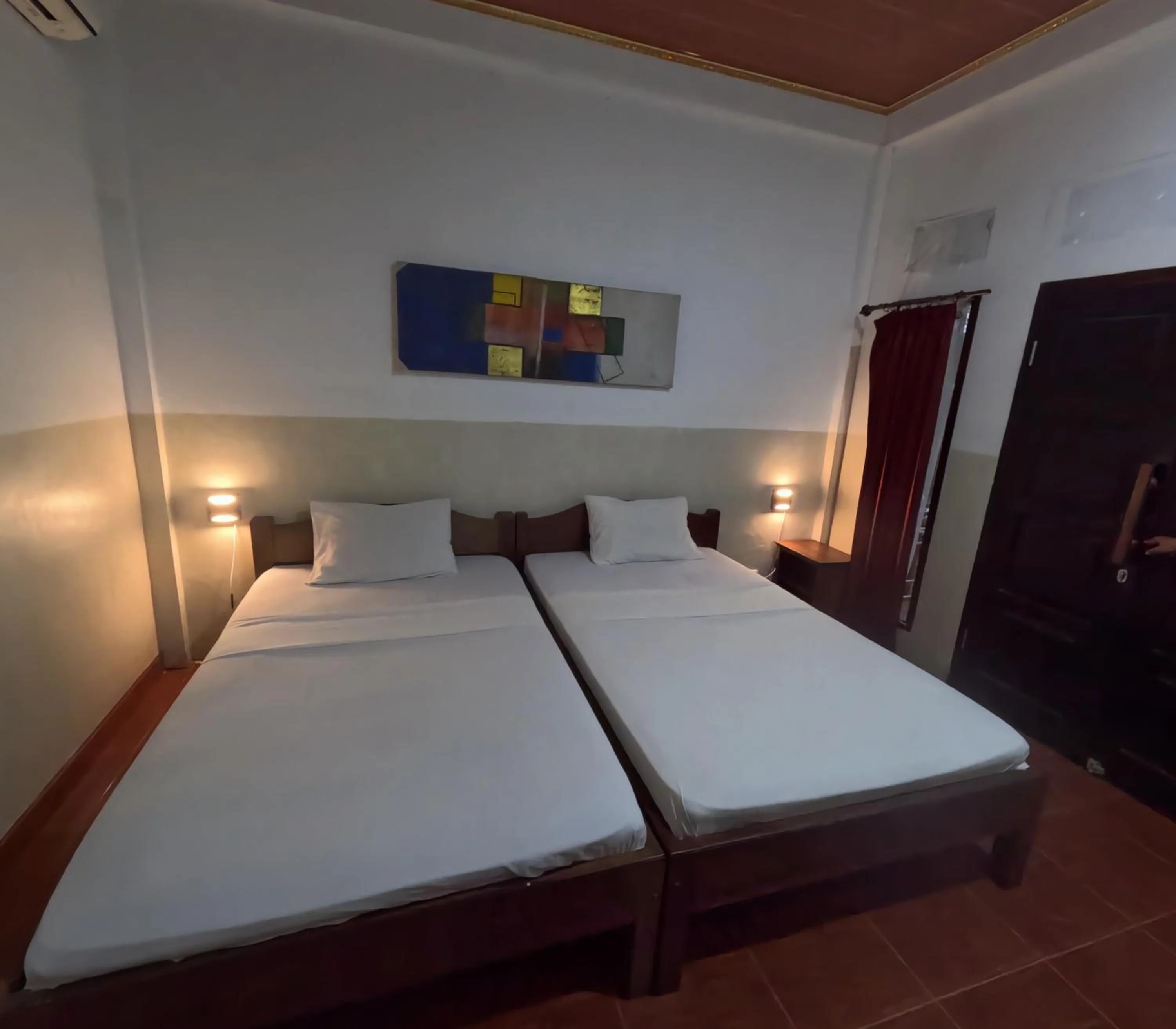 Bed in Banana Leaf Bungalow