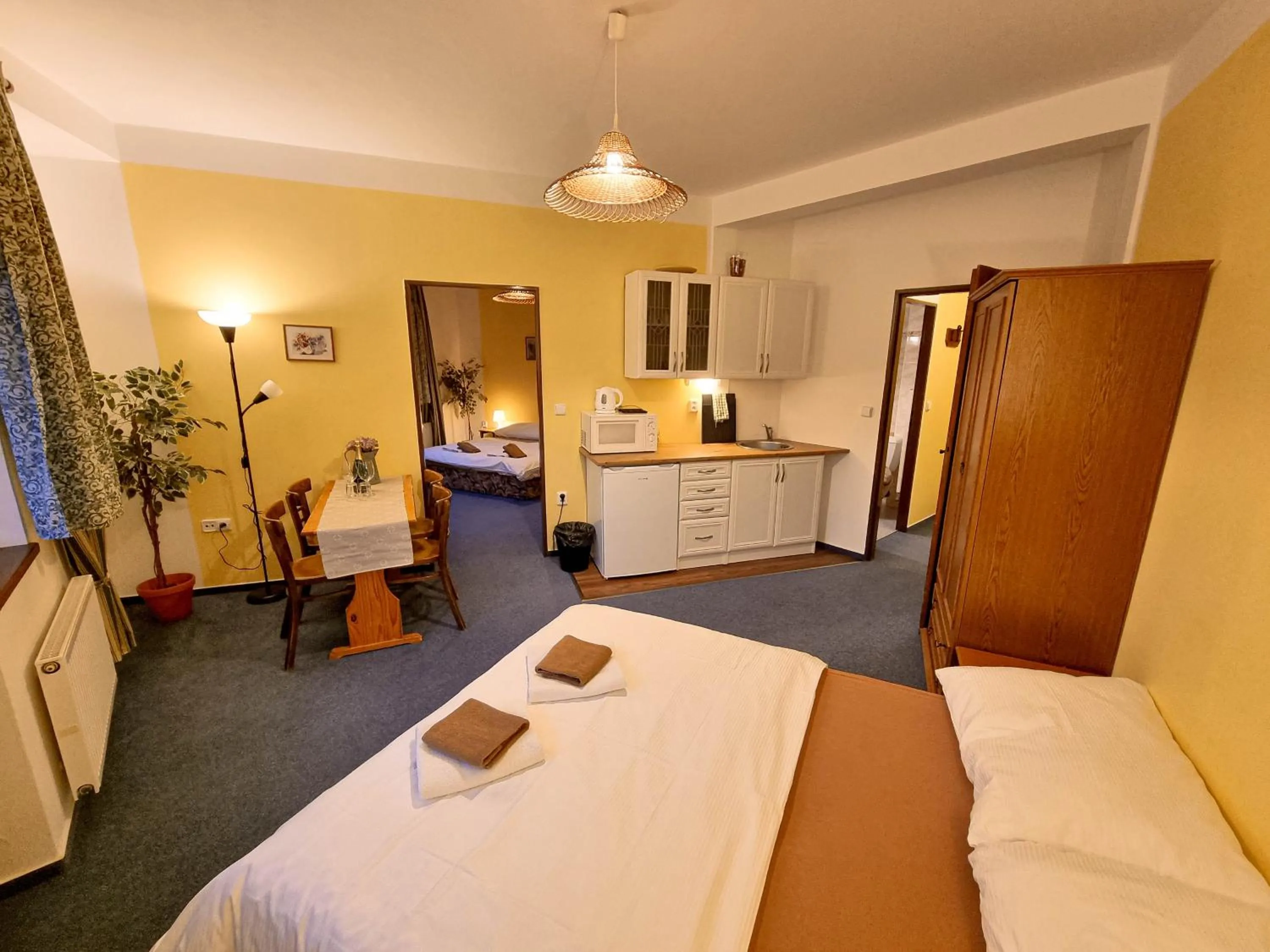 Kitchen or kitchenette, Bed in Penzion Rotunda