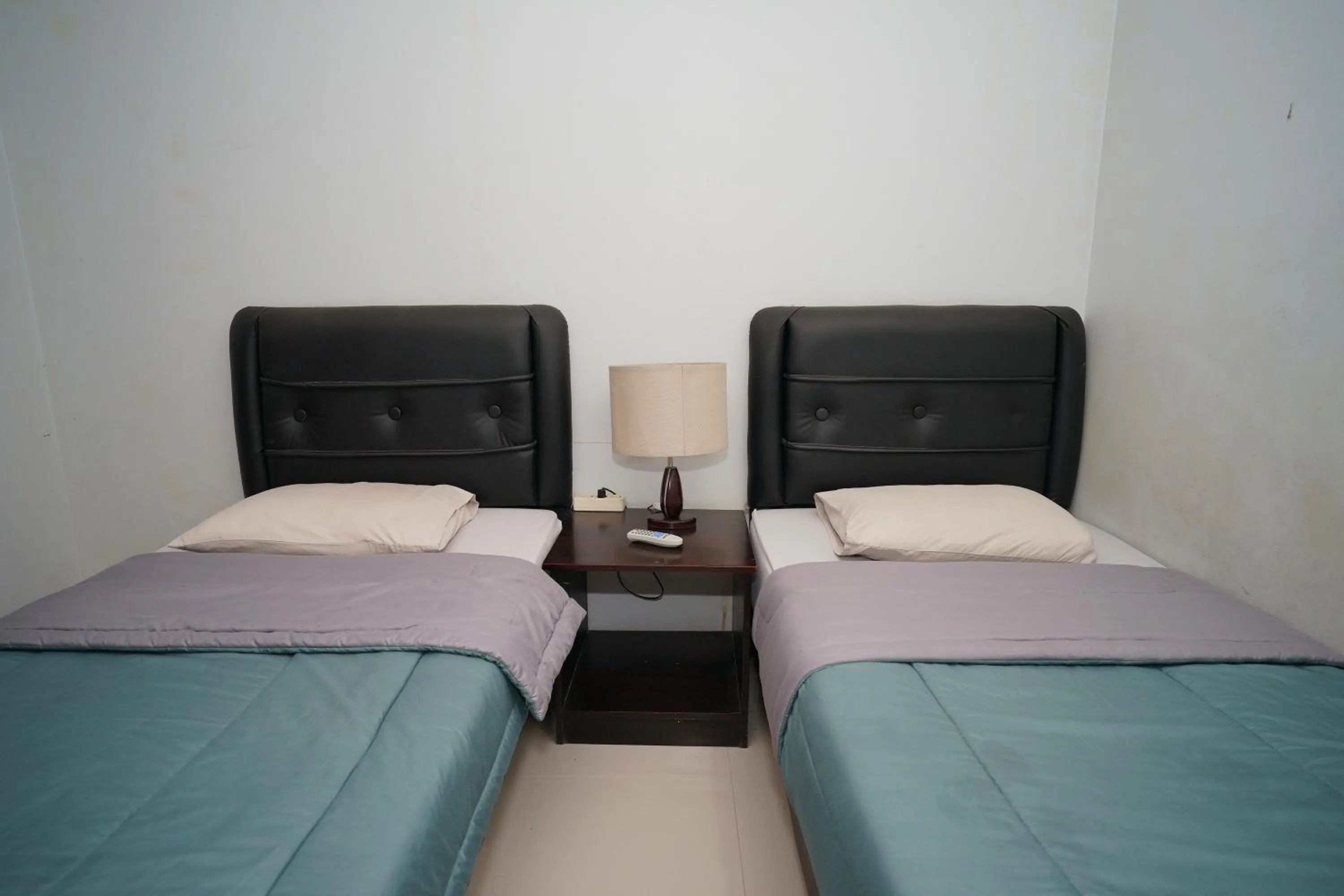 Bed in Hotel Puri Pangalengan