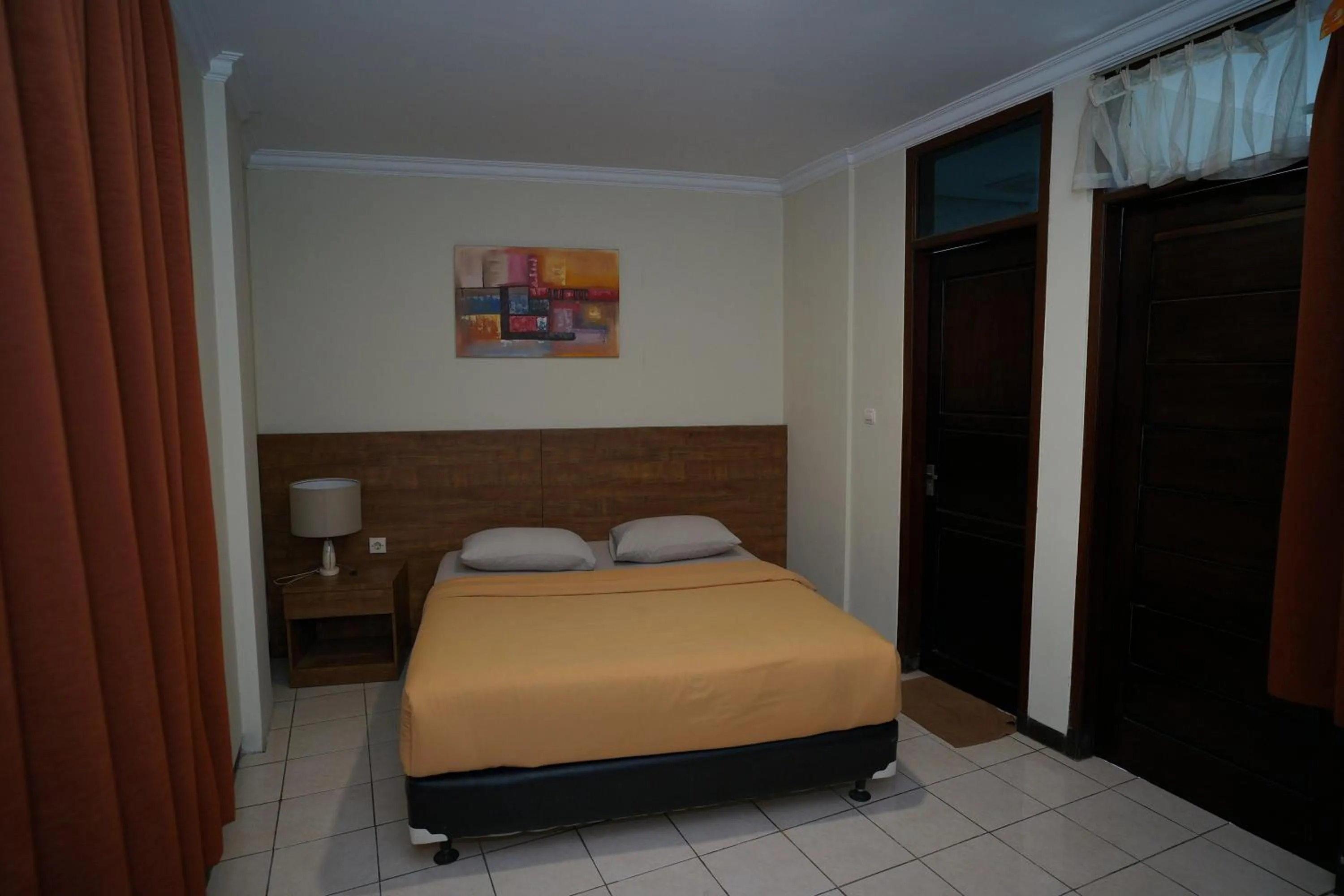 Bed in Hotel Puri Pangalengan