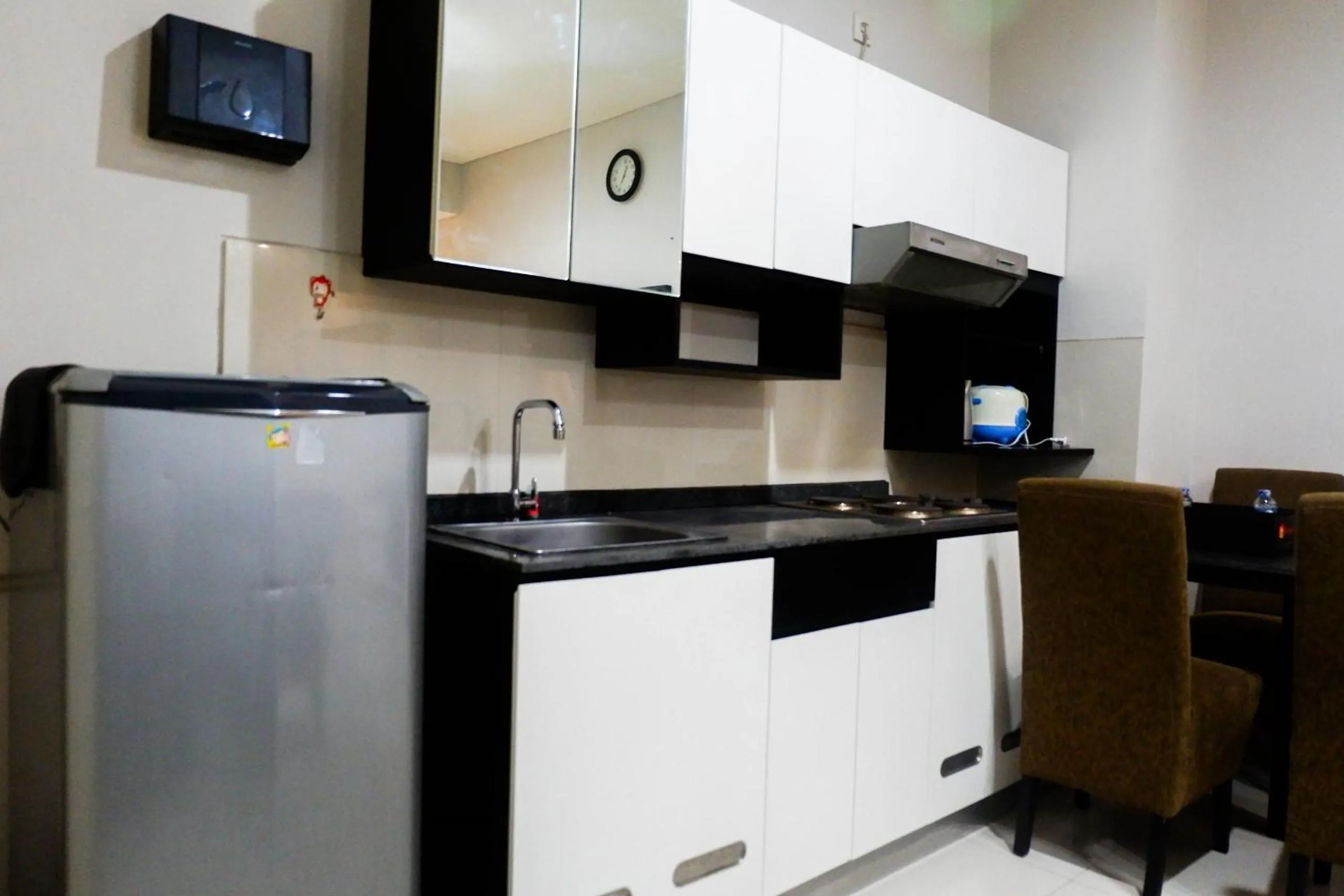 Kitchen or kitchenette in Strategic 2BR Apartment at Trillium Residence By Travelio