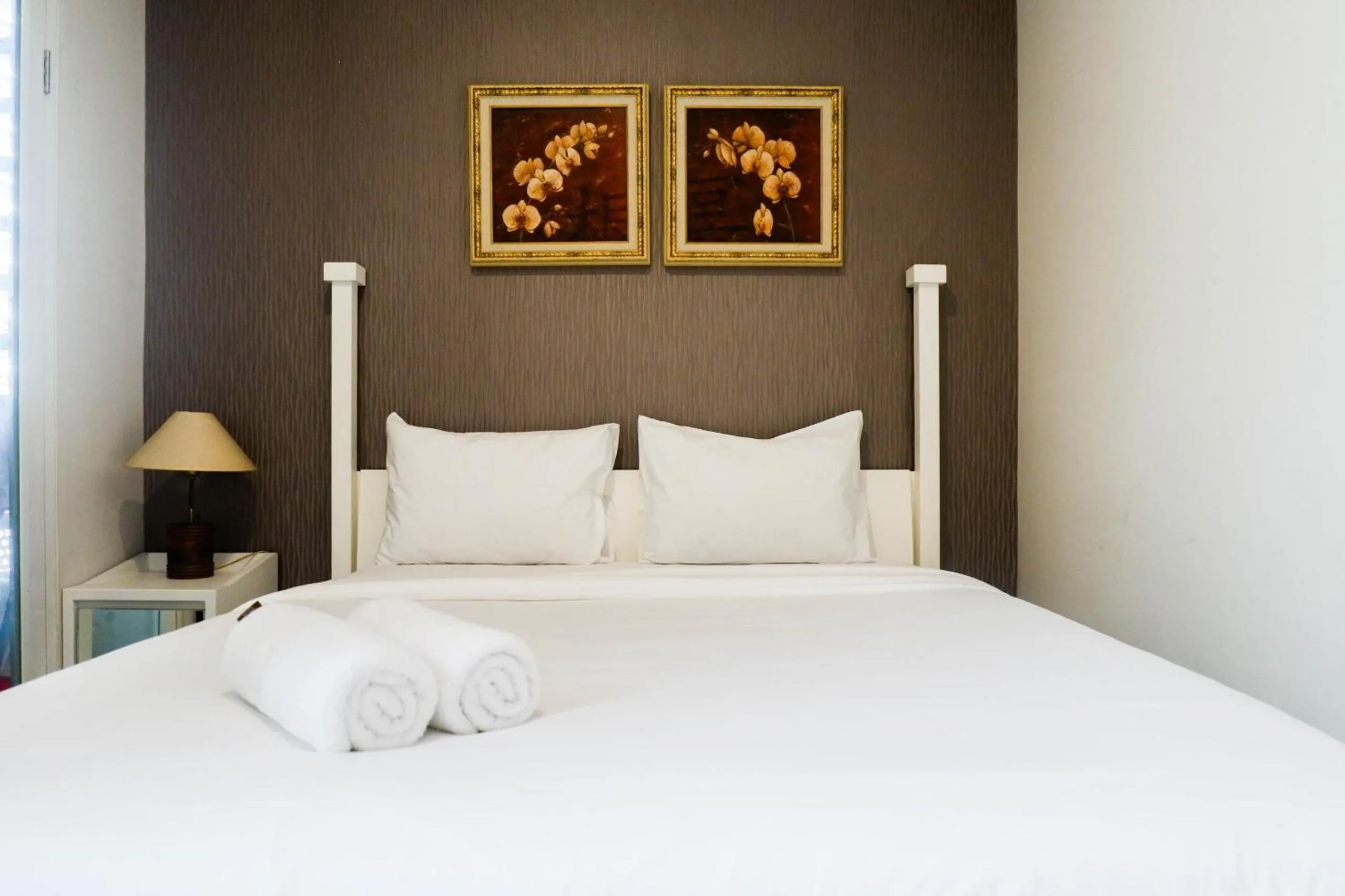 Bed in Strategic 2BR Apartment at Trillium Residence By Travelio