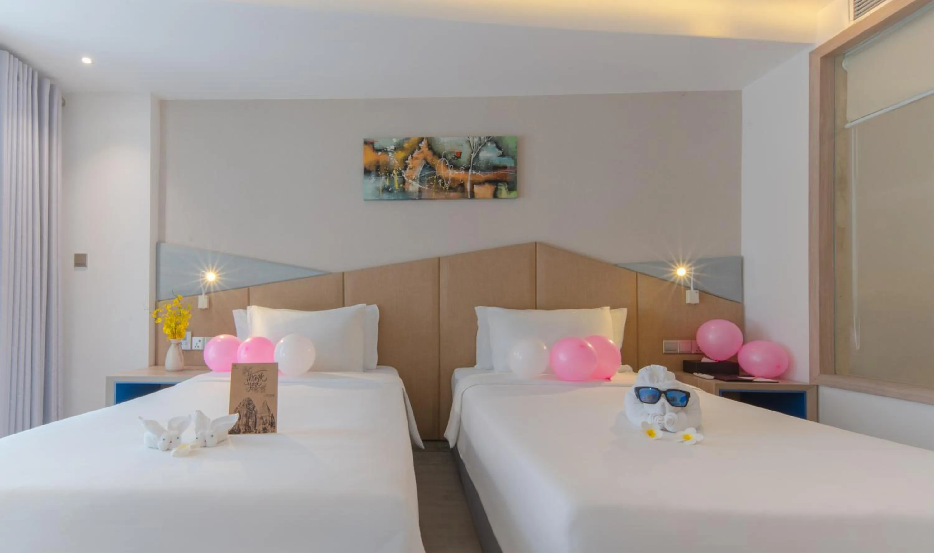 Bed in Le's Cham Hotel