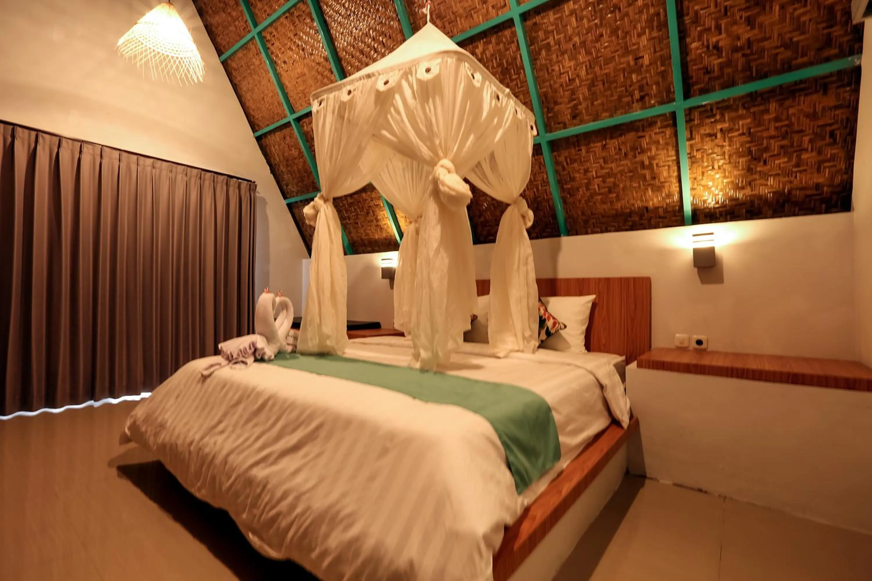 Bed in Makarma Resort Lombok