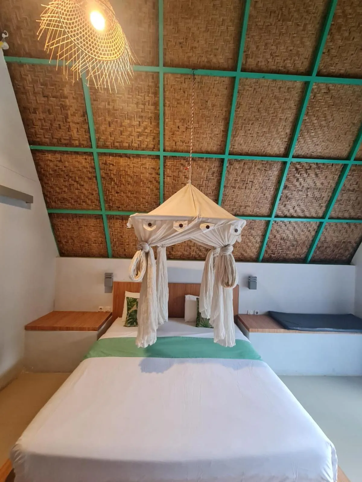 Bed in Makarma Resort Lombok