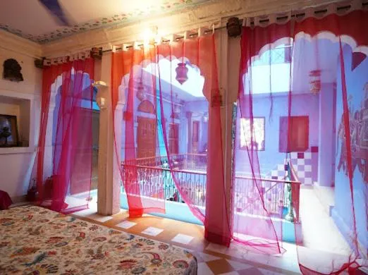 Bed in Yogis Guest House