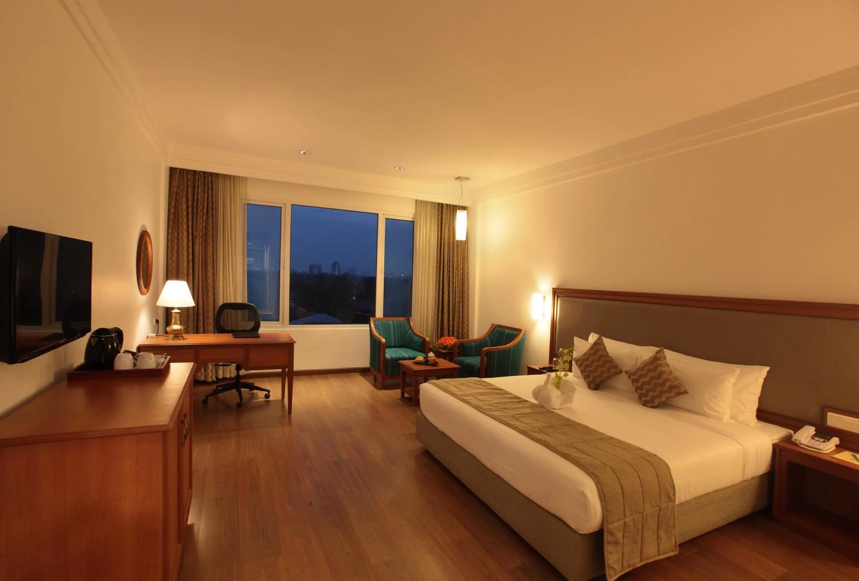 Bed in Monsoon Empress Kochi