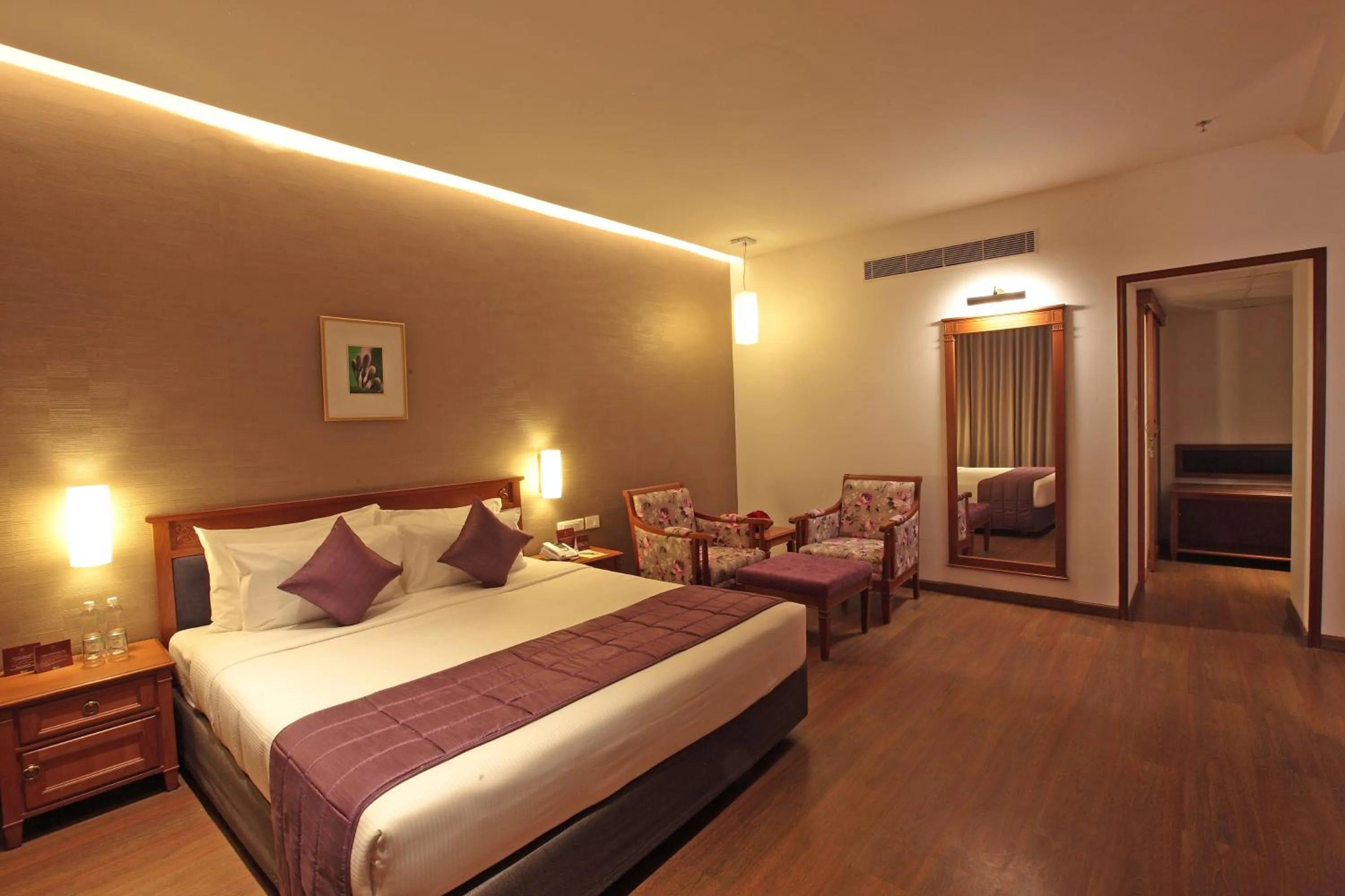 Bed in Monsoon Empress Kochi