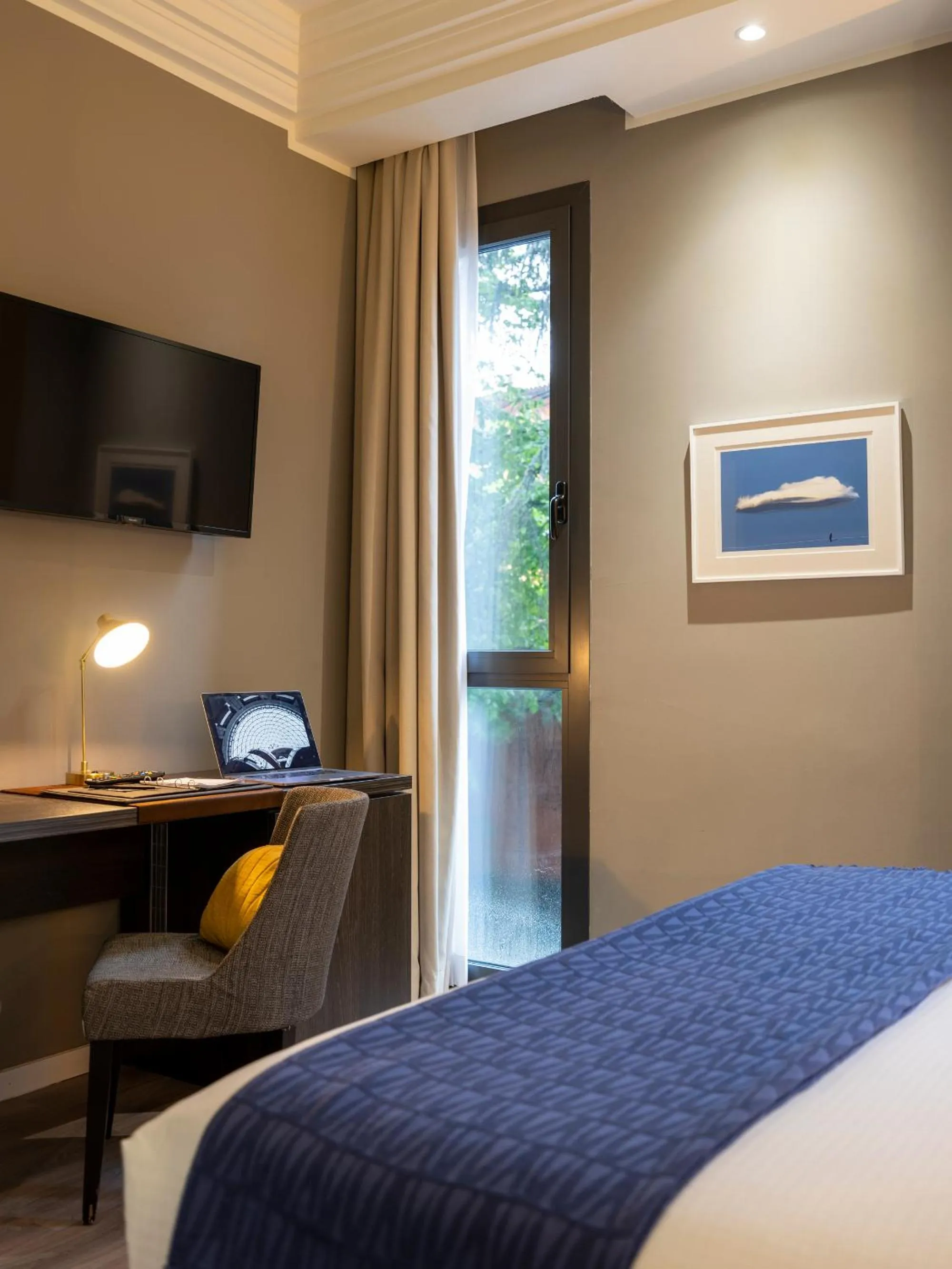 Bed in Elizabeth Lifestyle Hotel