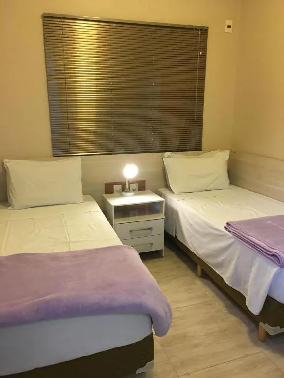 Bed in Leme Plaza Hotel