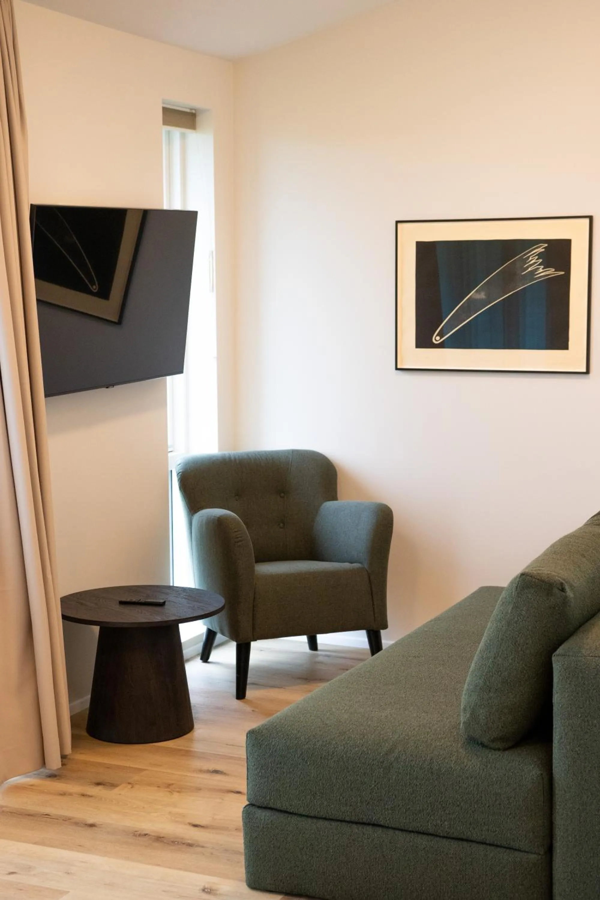 Communal lounge/ TV room in Hótel Eldhestar