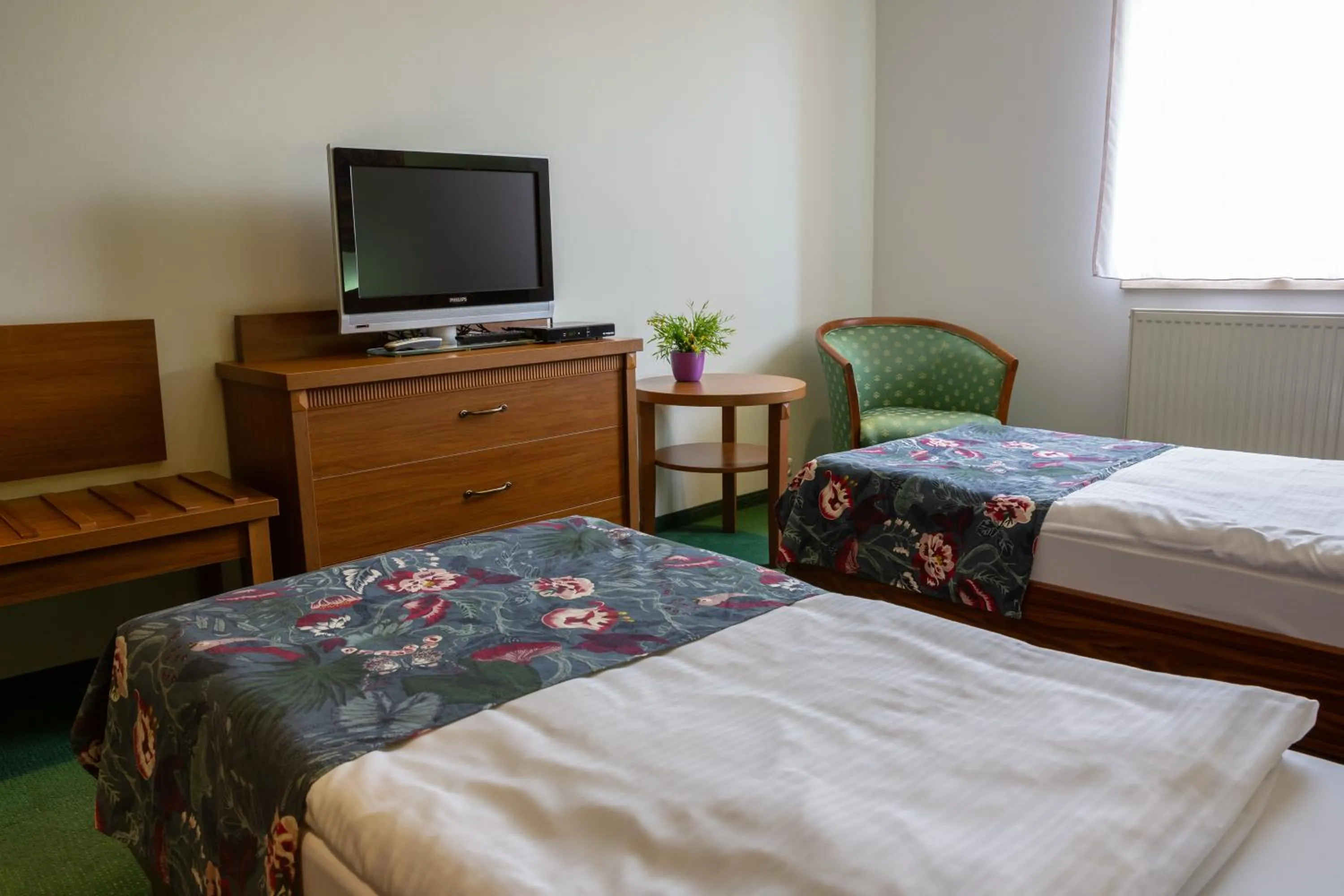 Bed in Hotel Max Inn