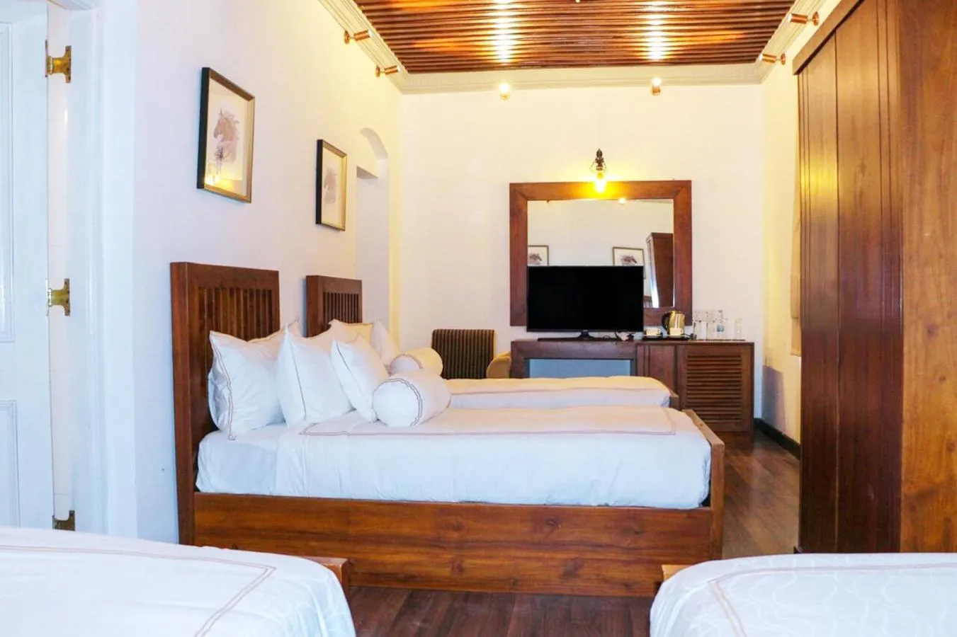 Bed in The Clovelly Bungalow