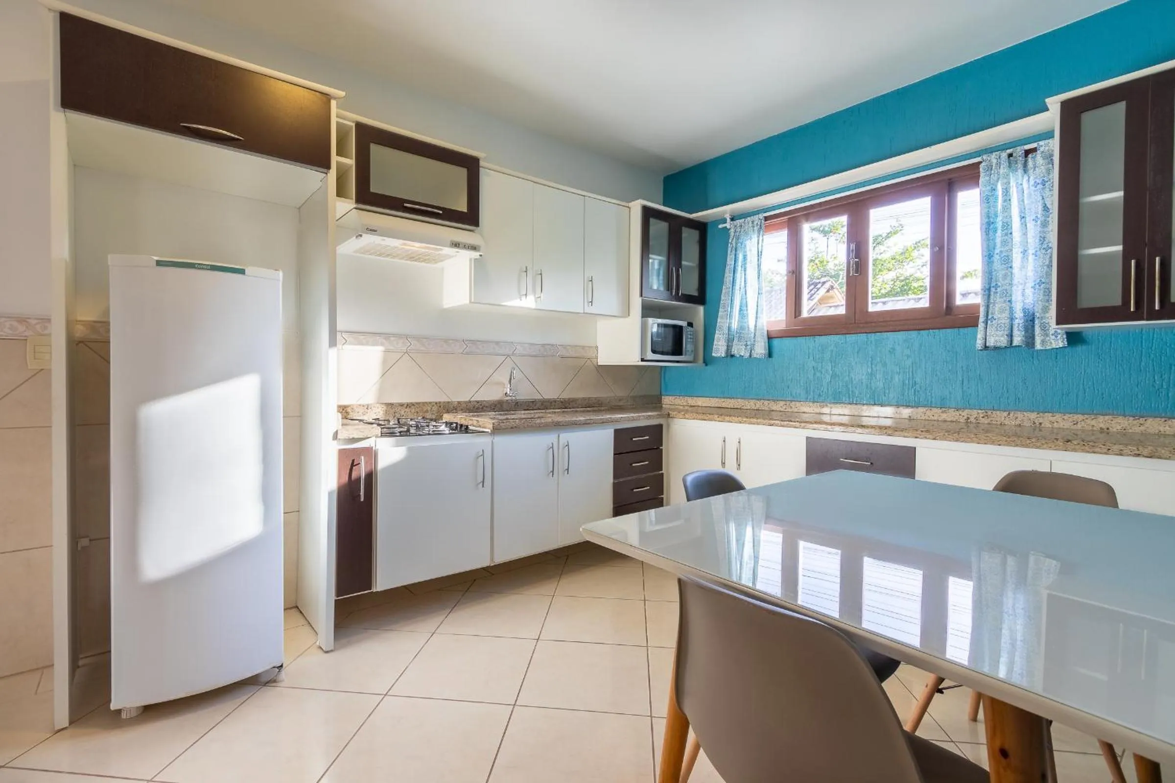 Kitchen or kitchenette in Pousada Areias do Rosa