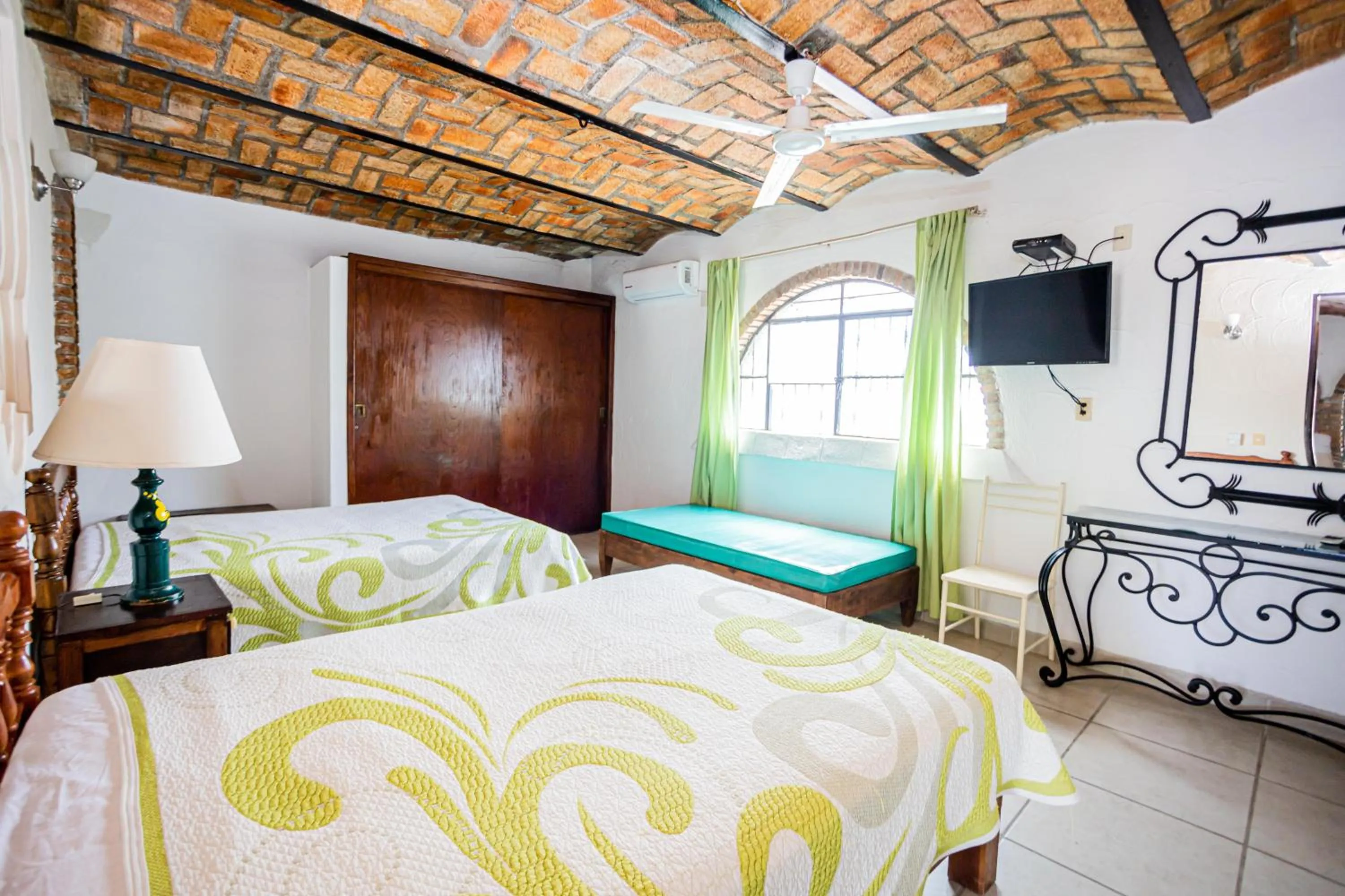 Bed in Bungalows Maria Teresa